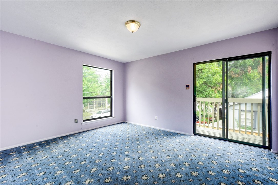 Photo #17 What blue flowery carpet? Seriously, windows are dual-paned and sliding glass door leads to lovely balcony/porch.