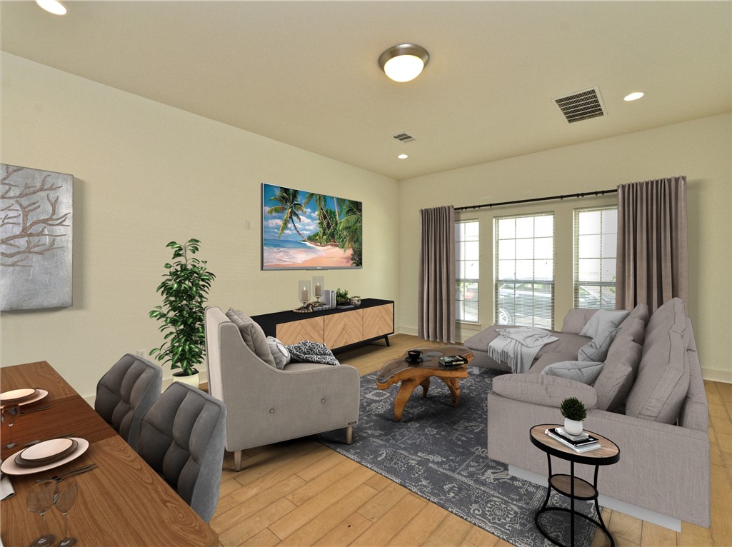Photo #5 First floor Living/Dining area virtually staged