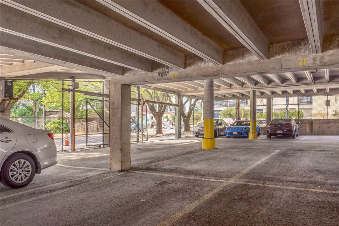Photo #14 Parking garage showing space #20 conveniently located near exit and ground level