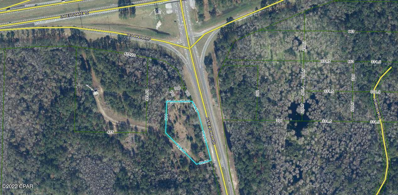 Commercial land, high and dry, located south of I-10 at exit 104, Caryville, immediately on the right. Over 406 feet of Hwy frontage. Excellent location for a gas station, convenience store, or whatever business you would like.