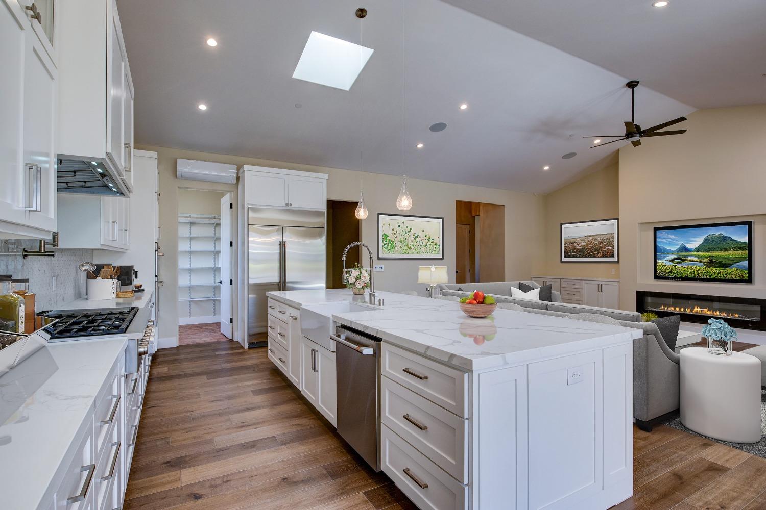 Imagine yourself cooking in this beautiful kitchen while watching football.  Virtual picture.