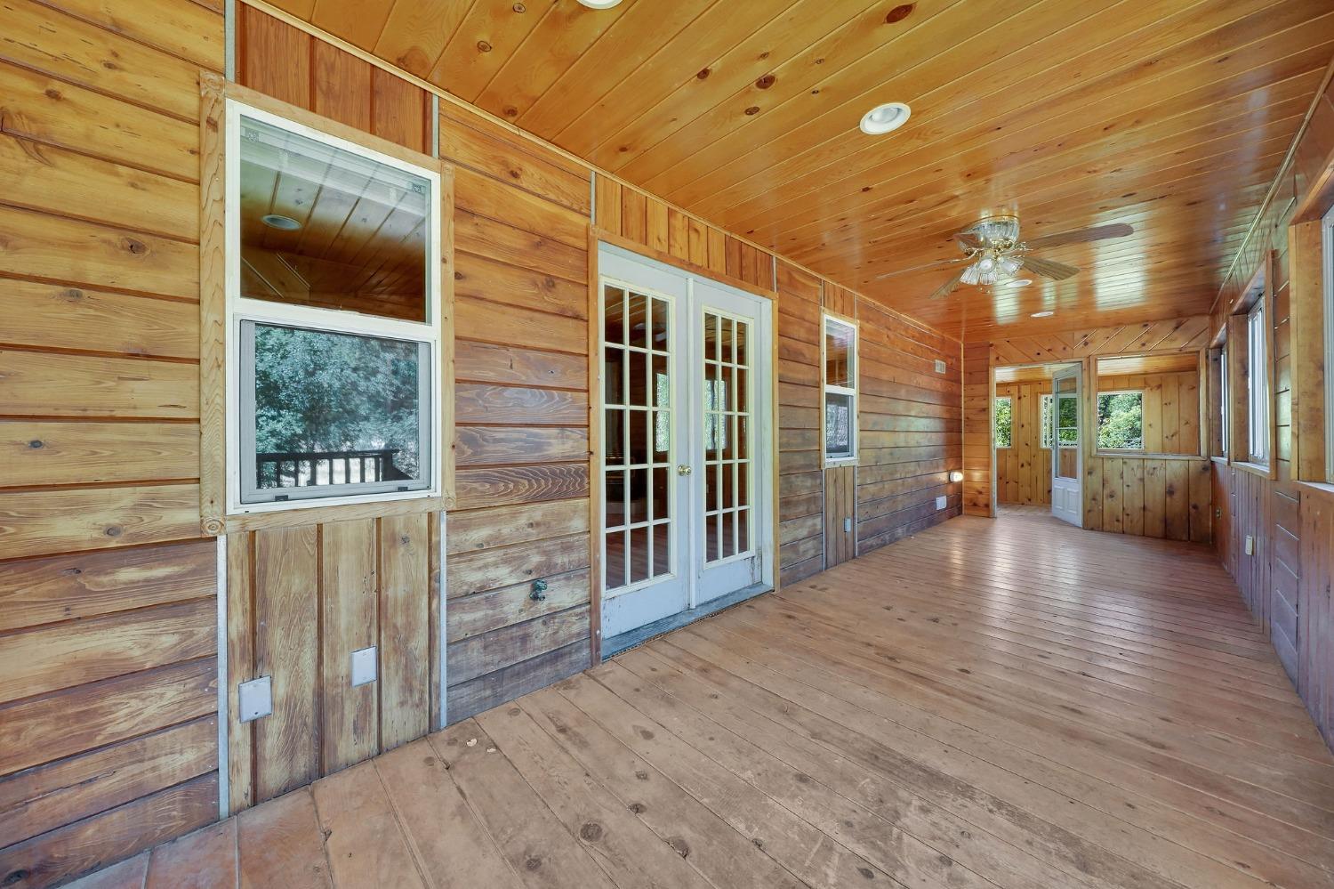 French doors lead you into the Guest bedroom