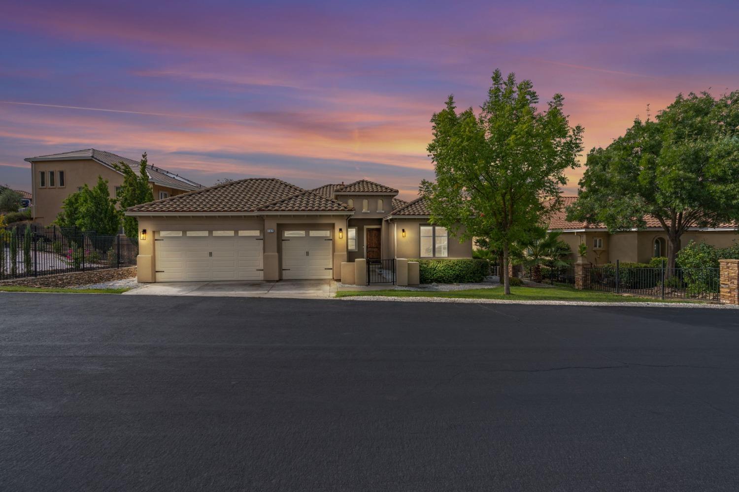 Beautiful curb appeal with brand new exterior paint, landscaping and light fixtures!