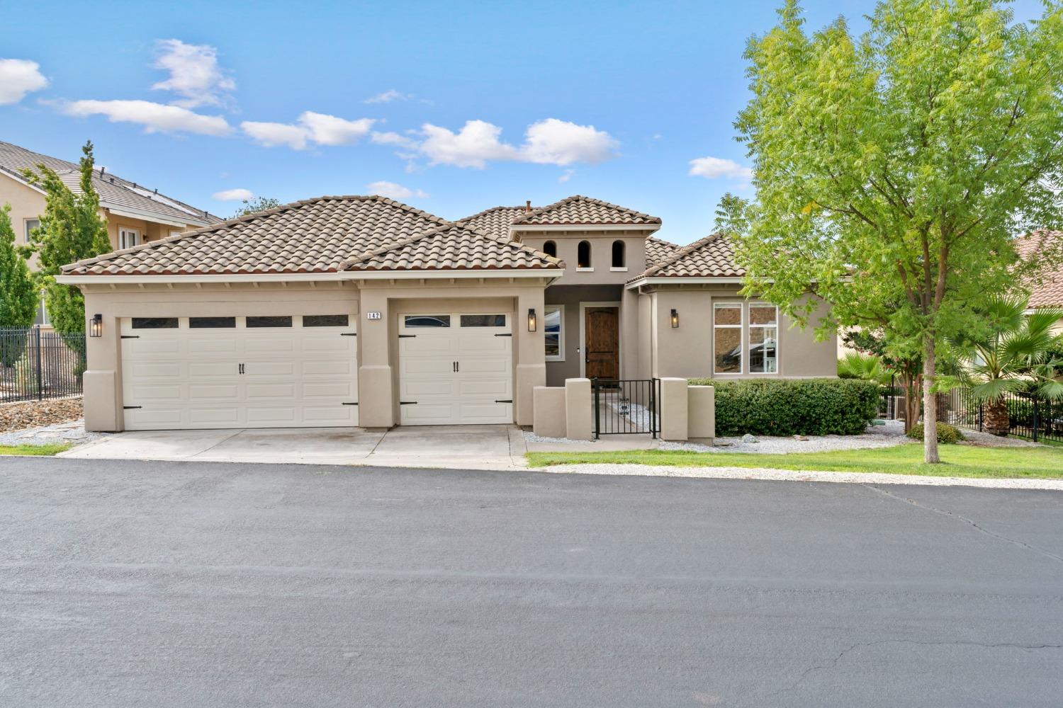 Almost level driveway with a very slight downslope.