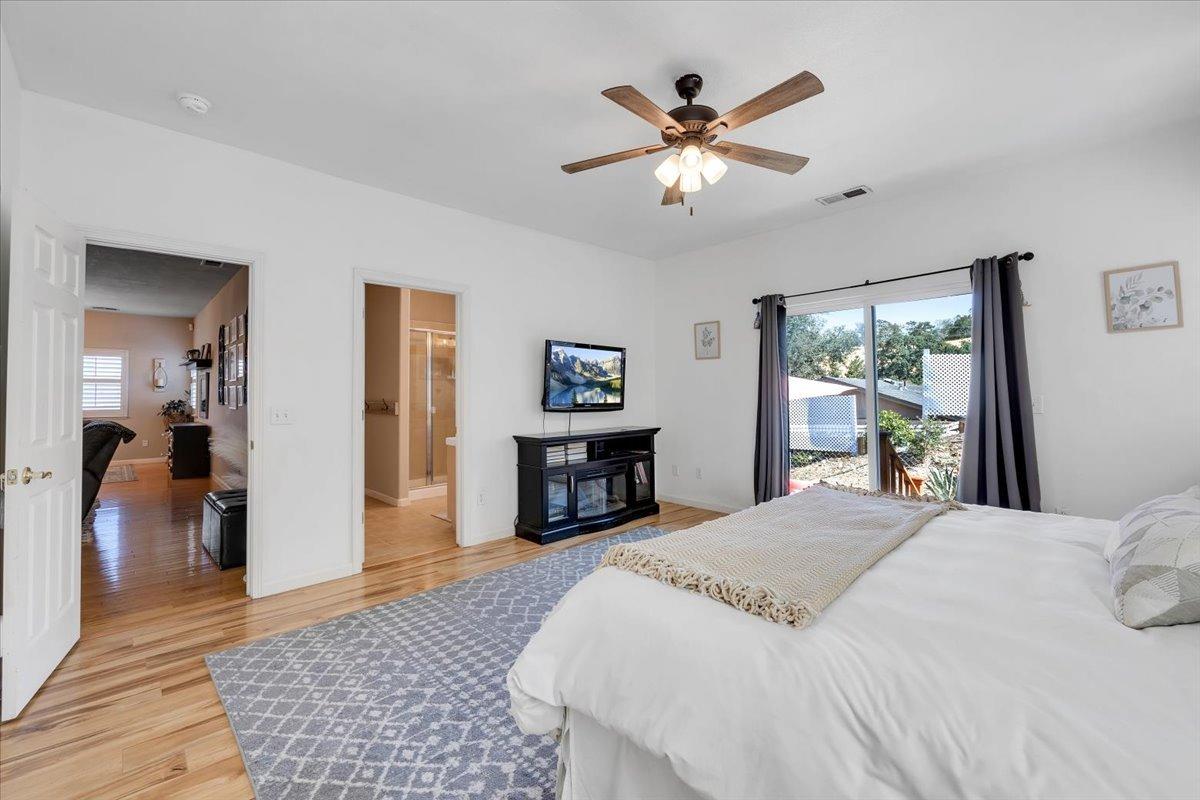 Wood-look flooring and ceiling fans throughout!