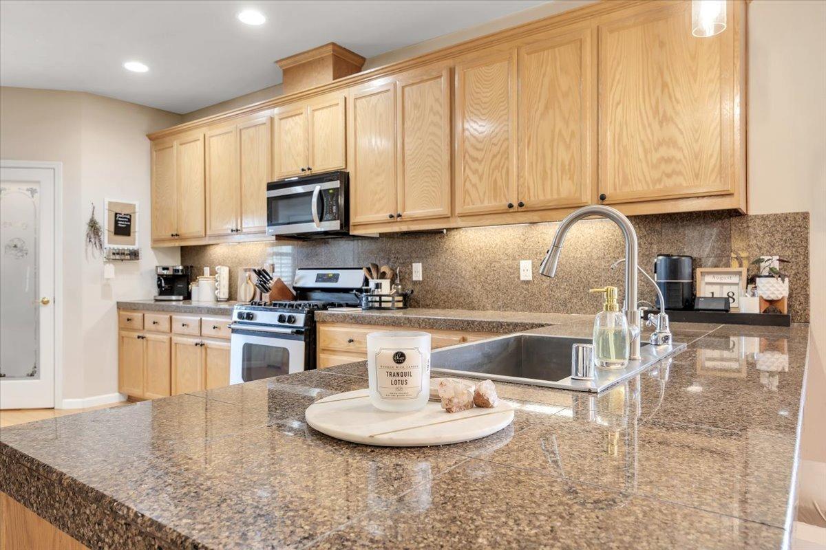 Kitchen leads to the stairway downstairs...