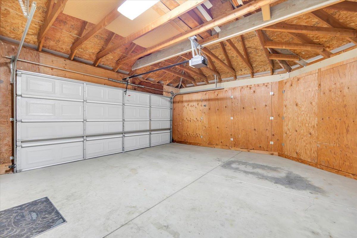 Interior of upper 2-car garage with TONS of built-in storage.