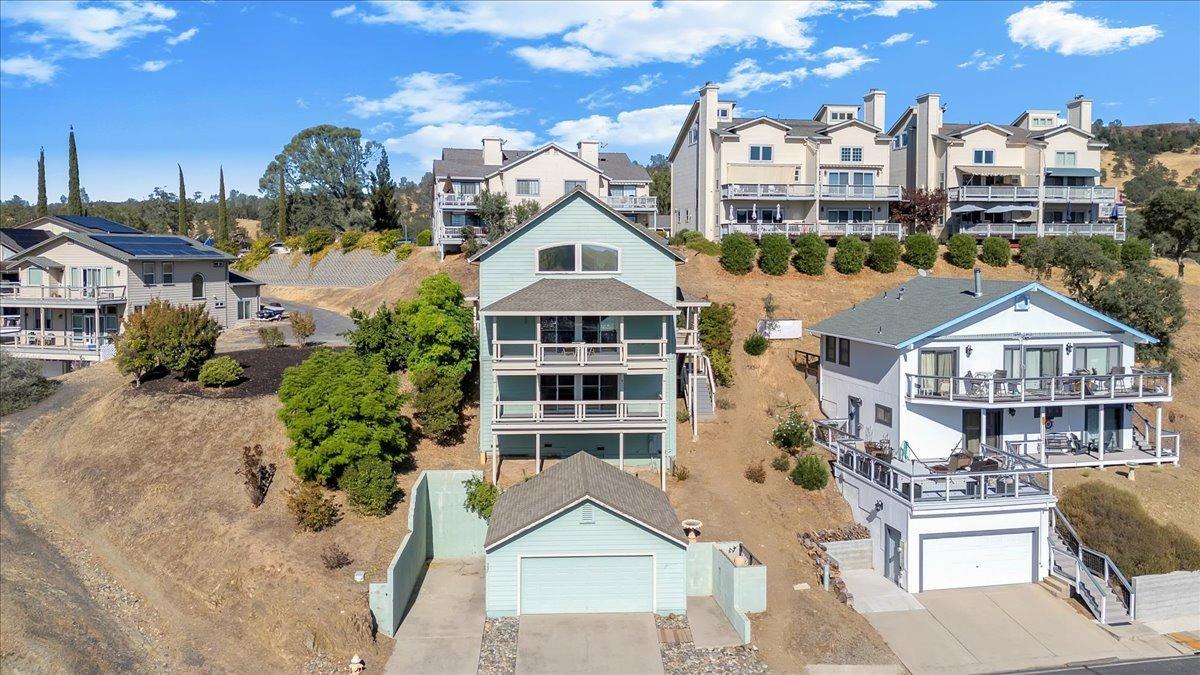 GREAT boat/RV parking pad next to lower 2-car garage!