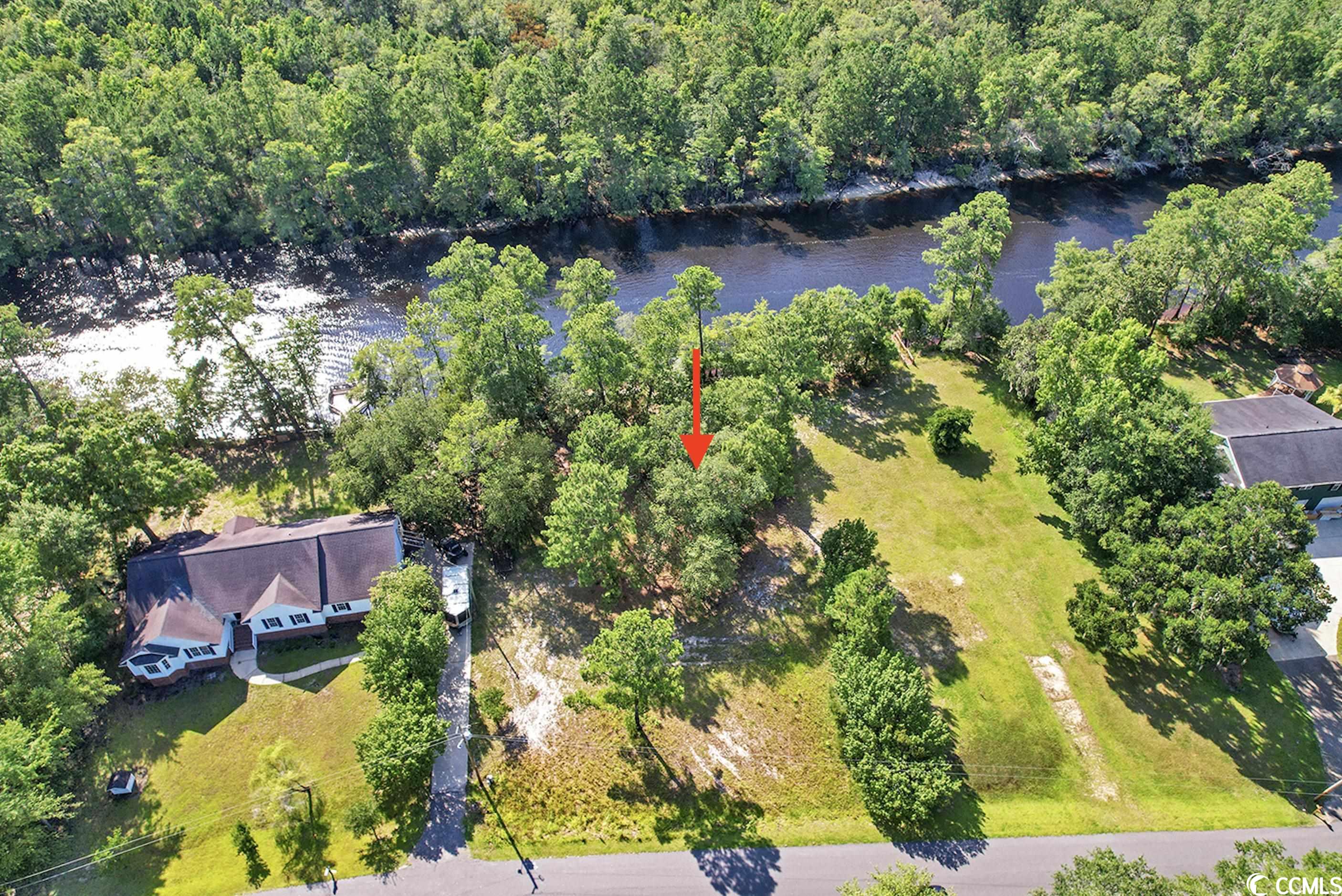 come build your dream home! this lot is over half an acre and located on the waccamaw river with a serene view of the waccamaw in the beautiful community of gray oak estates. this community of custom homes will leave you speechless. you may take your time and not feel rushed, as there is no timeframe to build. enjoy boating, swimming, & more with a short distance  to the boat landing. only a 15 minute drive to the beach and 10 minutes to international drive and hwy 22. don't miss out on this beautiful large lot on the river in one of the more desirable river communities in the area.