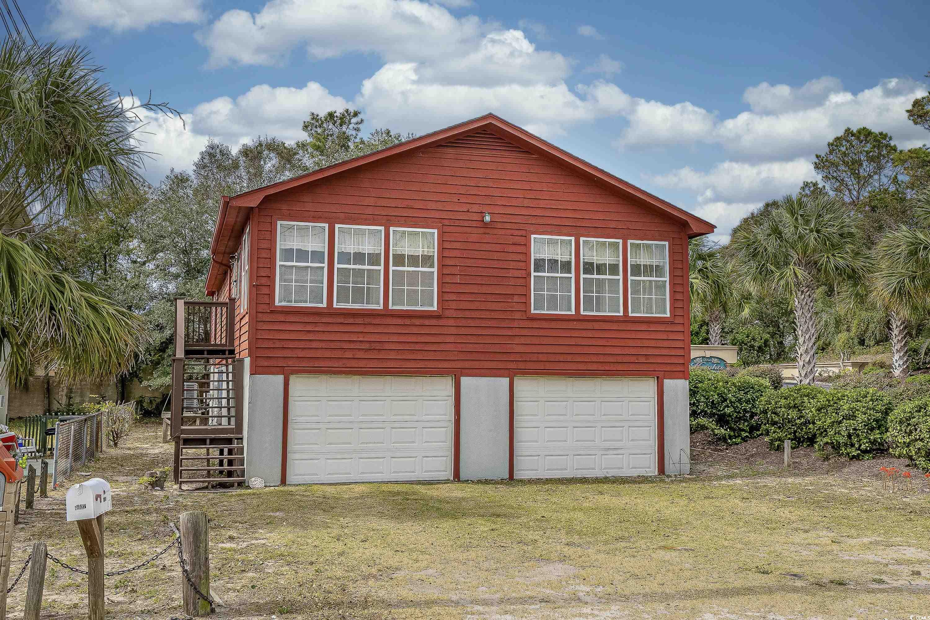 reduced!! great little beach community only 2 blocks to the beach with direct beach access.  one owner home with 4 bedrooms, 3 baths upstairs, and another bedroom, bath downstairs.  lots of living space and laundry facilities up and down.  laminate flooring except for the bedrooms up which has original carpet.  huge areas down have 2 car garage, storage rooms, workshop, plus more.  this is a one owner home and has never been rented. the front has an unheated sun porch, and the back has a large deck overlooking a nice, fenced backyard with huge shade trees.  this is a perfect retreat for a large family that is within walking distance to the beach.  some minor repairs are being done.  heating and air and roof have been replaced since home was built.  2 downstairs refrigerators do not convey  this home is a one owner home and has never been offered for sale.
