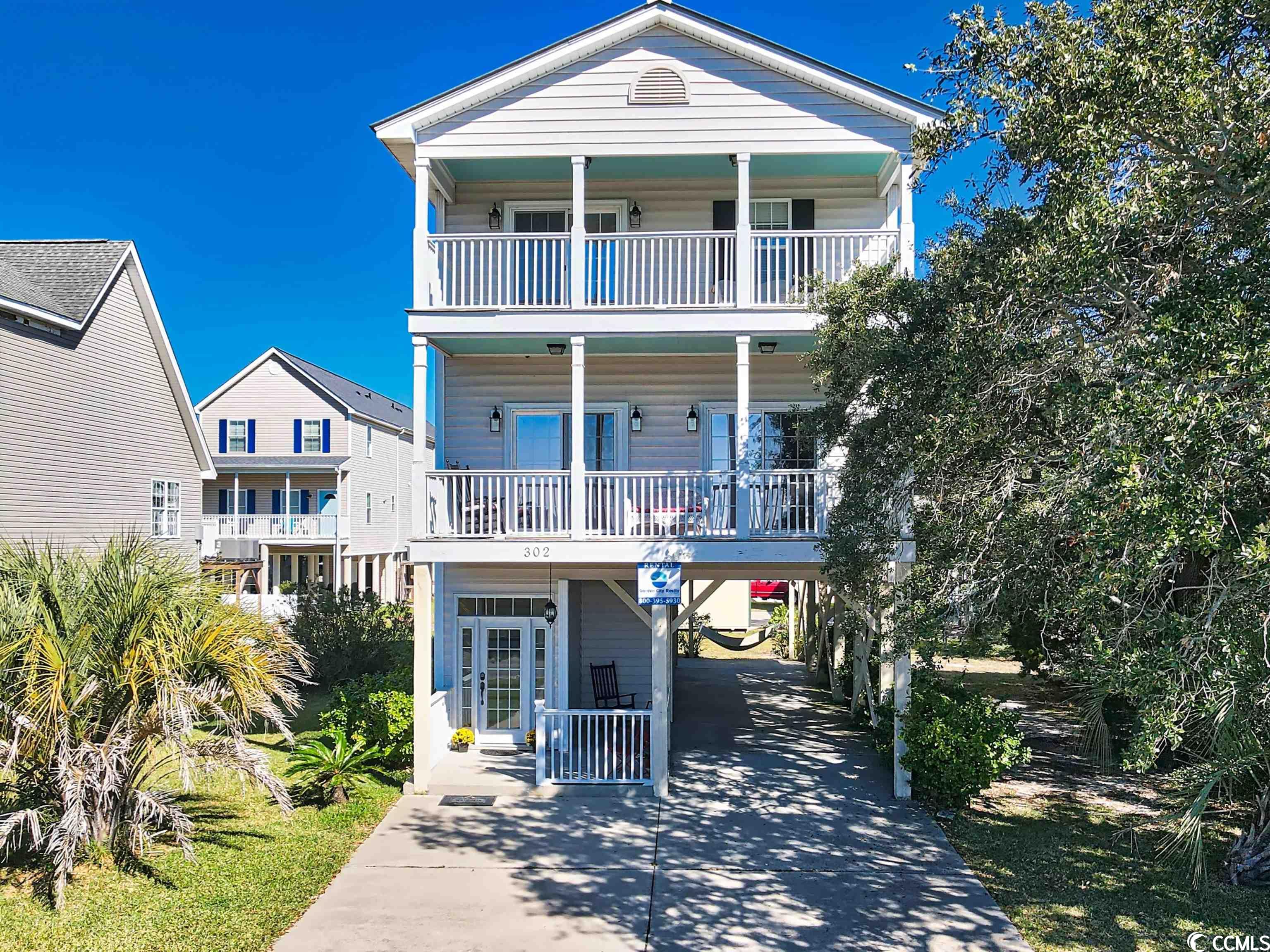 welcome home to 302 seabreeze dr in garden city. sitting directly across from the marsh, this home has amazing & gorgeous views that you will never get tired of seeing! have your morning coffee soaking up the sunrise, and your glass of wine at dusk watching the mesmerizing sunset! this 5 bedroom 4.5 bath raised beach house has double porches off the main living floor & 2nd floor, so you will never miss a sunrise or a sunset. this home offers two owner's suites on each floor. the main living floor has an owner's suite and bath with 2 showers, the half bath, a wet bar, the kitchen which is open to the living room and dining area making it great for entertaining. the 2nd floor has another owner's suite and bath along with the other 3 bedrooms and 2 baths & laundry area. there is an outside storage unit underneath the house for your grill, beach chairs, & other beach items.  being only a few blocks from the ocean, this location is a short walk to the beach or a golfcart ride to sam's corner to grab a world famous hotdog, play arcade games, or go for a walk on the pier.  garden city is just a short ride to the murrells inlet marsh walk for dinner & entertainment. this home is a must see to experience the views of the marsh for yourself!  home is being sold furnished & washer/dryer does convey with property (new washer installed december 2022). ***new train hvac installed july 31, 2023 by air doctor services. warranty will transfer to the new owner!