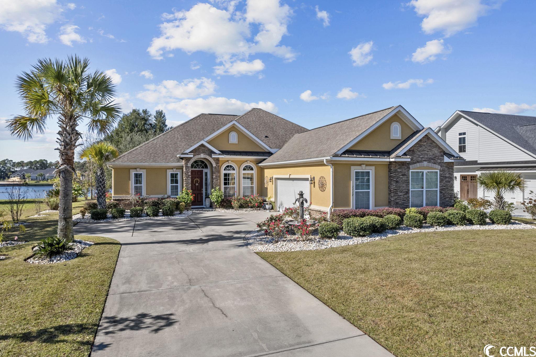 Don’t miss this rare opportunity to own this better than new, completely updated 4-bedroom, 3.5 bath home with an oversized 2 car garage on the large 180-acre lake, in the highly sought-after natural gas luxury lake front community of Wild Wing Plantation. Have you ever dreamed of living on a large lake where you can fish from your back yard or boat to the amenities center to enjoy a resort like pool complex/country club with family or friends? Well now is your chance.   The stately front entrance welcomes you into this bright sunny breathtaking home with stunning views of the lake. The Great Room has 11’ high ceilings, hardwood floors, Dolby Atmos surround sound wired/speakers, gas fireplace with antique Charleston double mantle. The Smart TVs in the great room and the master bedroom are encased in decorative custom-built cabinets that can be open or shut to enhance the décor of the home. The formal dining room has a dramatic tray ceiling and large palladium window, that floods the home with natural light.   The gourmet chef’s kitchen includes; professional grade stainless steel appliances including; 36” Wolf Natural Gas range, 48” SubZero refrigerator, Bosh dishwasher, in-wall 2nd oven/microwave, cast stone range hood, high end floor to ceiling custom cabinets, pull out trays, glass insert accent cabinets, with soft close dovetail drawers and doors, luxury granite quartzite honed countertops, solid granite stone farm sink, custom tile backsplash, under-cabinet lighting, two pantries, whole house water filtration system, reverse osmosis system and even an island bar that comfortably seats six.   The Carolina Room boasts 180-degree views of the lake. The home has a split bedroom plan with a spectacular master bedroom suite with views of the lake. Features include; tray ceiling, huge walk-in-closet, steam sauna/shower, copper claw foot bathtub with herringbone porcelain tile tub surround, fireplace, custom vanity cabinets with vanity tower, luxury granite quartzite honed countertops, His/Her sinks, private commode, bidet and porcelain tile floors.   The laundry room has been craft-fully converted into a butler’s pantry, with tiled backsplash, washer/dryer cabinet, and coffee bar. The oversized 2 car garage has additional outlets/circuit breakers and new panel wired for generator, hot tub/spa, garage refrigerator, tool charging station, wine cooler, and garage refrigerator.   The 4th bedroom, with French door entrance overlooks the lake and has been converted into a media room, with Dolby Atmos surround sound and oversize 8’ wide slider that leads to the EZ-Breeze room with outdoor surround sound speakers.   The meticulously maintained .59 acre yard features cement and paved patios, wired for hot tub, two elegant fountains, river rock, and 50 landscape lights. The home has an irrigation system with water conservation nozzles, rain filter and separate meter. Additionally, there is a screened in 12’ cedar octagon gazebo with Cupola. The backyard has a recently painted, full-length seawall/boat dock that was just dredged, and a 8’ wide kayak dock. Use your boat to explore the lakes, fish, take in nature and the SC lake birds, including, blue heron, egrets, native swans and even eagles. Take your boat to the clubhouse to enjoy the many amenities there. Association amenities include large clubhouse, multiple outdoor pools, hot tub, 80’ waterslide, fenced in tennis/pickle ball, basketball courts, playground area, huge day dock, private boat ramp and boat/RV storage. Be sure to have your Realtor ask about the current Wild Wing Golf Club membership promotion! Wild Wing Plantation offers convenient easy access to Coastal Carolina University, shopping, the beaches and all that Myrtle Beach and Conway has to offer. Don’t miss out on this rare find, have your Realtor schedule a showing today!   All measurements and square footage are approximate and not guaranteed. Buyer is responsible for verification. Listing Agent is owner.