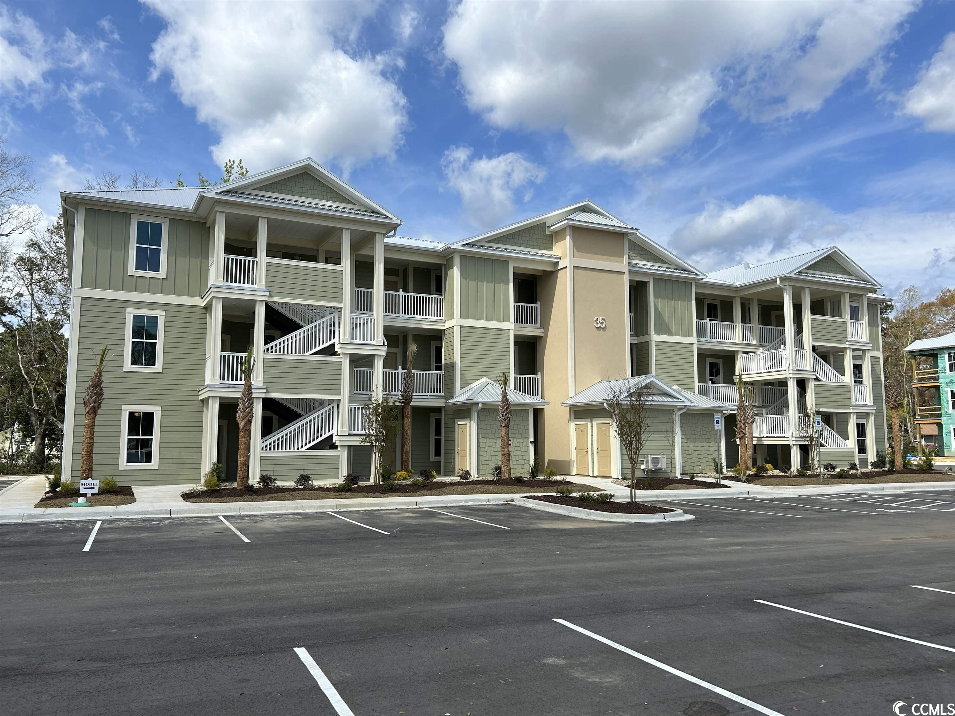 this condo community is located in the heart of the south carolina coast in a charming, historic fishing village. enjoy boating, live music, restaurants and scenic marsh views. it is located just 20 miles south of myrtle beach. the condos boast hardwood floors in the living areas, granite countertops in the kitchen and much more. each building has it's own elevator. enjoy the community pool and clubhouse. (specifications and colors may vary.) square footage is approximate; the buyer and buyer's agent are responsible for verifying all square footage and all other information. square footage and acreage came from the builder's floor plans. seller/builder reserves the right and may change these floor plans, specifications, dimensions without prior notice.  boxwood plan