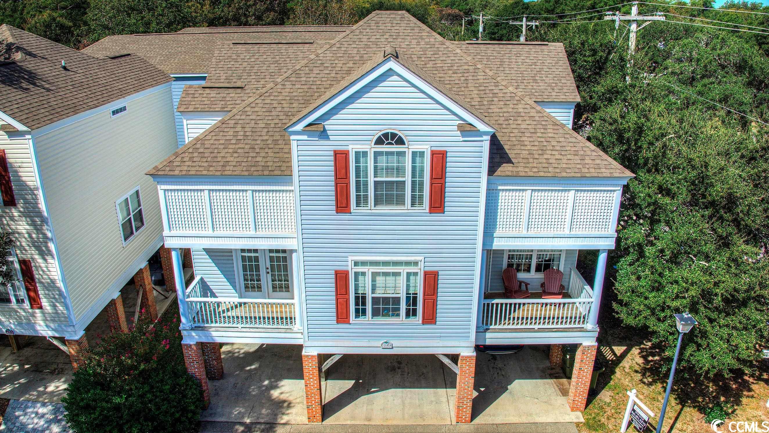experience coastal living at its finest in the serene town of surfside beach. perched just moments away from the beach, this expansive 5-bedroom, 4.5-bath residence offers a haven of relaxation and luxury. from your front balcony, embrace the soothing ocean breezes and the scent of salt air, setting the tone for countless cherished memories. recent upgrades include fresh paint throughout the main floor and new flooring in the bedrooms, elevating the ambiance of the home. the kitchen boasts brand-new appliances and countertops, seamlessly complementing the newly updated countertops and fixtures in the main floor bathrooms. thoughtful lighting enhancements further illuminate the home's elegant design. nestled in the sought-after myrtle oaks community, you're a mere 775 feet from the shimmering sands of the beach and a stone's throw from the refreshing community pool. let the hoa manage the meticulous landscaping and pool upkeep, leaving you more time to indulge in the pleasures of beach life. the convenient outdoor shower ensures a sand-free home after a delightful day at the beach. embrace the allure of local attractions as this abode is strategically positioned near the iconic surfside pier and is surrounded by a plethora of restaurants and attractions. both surfside beach & myrtle beach are at your fingertips, promising endless entertainment and dining options. whether you envision this as your forever home, a vacation retreat, or a valuable investment, its charm, location, and amenities, including its 5 bedrooms and 4.5 bathrooms, are sure to captivate."
