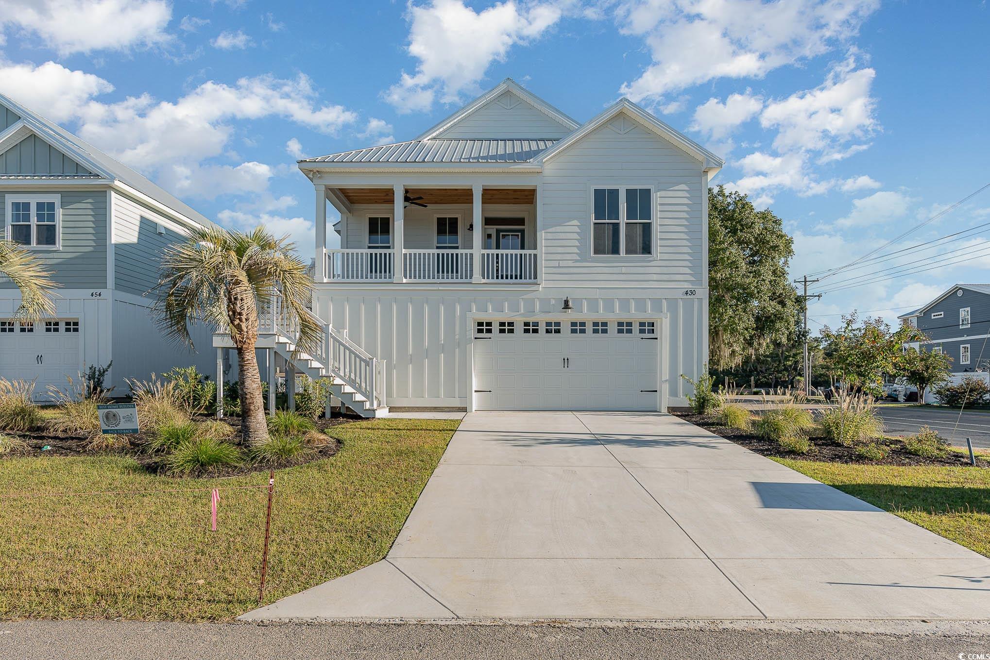 ready to move in! no hoa!! masterful design and modern luxury are uniquely embodied in this beautiful beach style home that offers 4 bedrooms and 3 bathrooms. every detail on this home has been carefully selected and quality crafted by a custom home builder. highlights include upgraded appliance package, quartz countertops, lvt floors, tile & carpet. enjoy the use of  a private neighborhood boat ramp for easy in and out entry to the murrells inlet creek. there is parking/storage underneath in a spacious garage and a beautiful professionally landscaped yard. a stones throw to all the shops, restaurants and world class golf murrells inlet, sc has to offer. building lifestyles for over 35 years, we remain the premier homebuilder of new residential communities and new home construction along the grand strand. we are the 2023 readers' choice for residential real estate developer. in addition, we hold the back-to-back title for best home builder from the sun news and wmbf news. we're appreciative to remain the grand strand's award-winning builder, and we're excited for you to experience the local pride we build today and every day in horry and georgetown counties. this home will not last long! call today!!