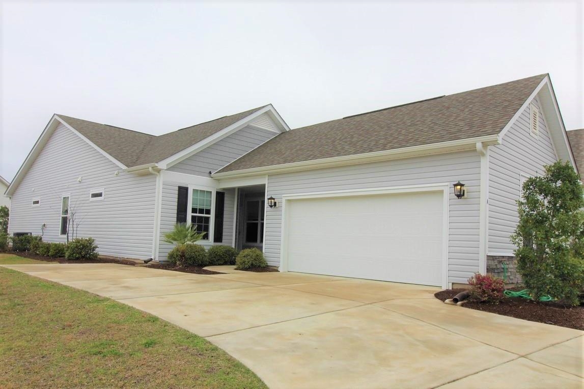 this 3br/2ba single level garden home with an attached 2-car garage offers a maintenance free lifestyle with great amenities in the highly desirable bella vita community. open concept with laminate wood flooring, cathedral ceilings, ceiling fans, solar lights & split bedroom floor plan. the kitchen features stainless steel appliances with 42" white kitchen cabinets, marble counter tops, back splash, kitchen island, breakfast bar & seating area. the master bedroom has been upgraded with an optional bay window. the garden homes at bella vita were built with energy efficiency standards & are energy star certified including: air barrier, additional sealing, r-15/r-38 insulation, low e windows, leds, hybrid hot water heater and much more. the back porch has been upgraded to an all-season room with windows & there is an extended patio for grilling and extra outdoor space. just a short walk to the community pool, clubhouse, fitness room and playground. bella vita hoa provides a maintenance free lifestyle: exterior maintenance, building insurance, basic cable, water/sewer, trash pickup, lawn care & irrigation. bella vita garden homes are located just off hwy 501, close to hwy 31, shopping, entertainment, restaurants, healthcare, the myrtle beach international airport and only a short 6-mile drive to the atlantic ocean.