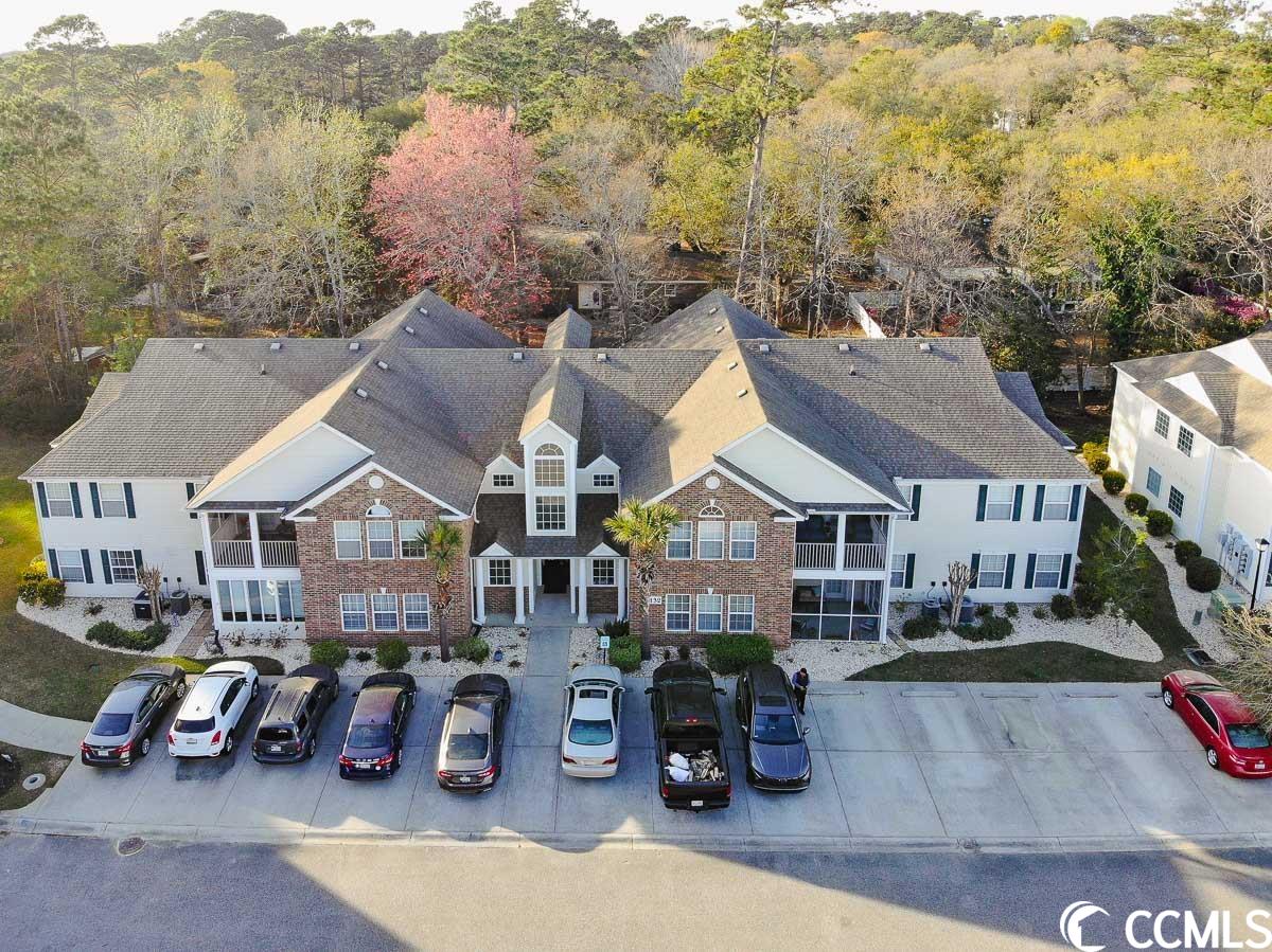 welcome to 132 brentwood dr, in the highly sought-after sterling pointe community of murrells inlet, just minutes from the beach! this gorgeous 3 bedroom, 2 bathroom end unit condo is the perfect second home or a new home in paradise. as you enter the unit, you'll be greeted by the open floor plan that offers a spacious living room with high cathedral ceilings, lots of natural light, and access to the screened-in balcony. the kitchen boasts a breakfast bar, plenty of counter space, and ample cabinet storage, making it perfect for preparing and enjoying meals with friends and family. the oversized master suite is sure to impress, featuring his and her walk-in closets and plenty of natural light. the master bath offers a dual sink vanity, spacious tub, and walk-in shower, providing a luxurious and relaxing experience. this unit also includes a laundry room and a storage room that can be used as a pantry, supply closet, or whatever suits your needs. enjoy the community pool at sterling pointe, perfect for relaxing and soaking up the beautiful south carolina sunshine. this home also features newer appliances, hvac unit, water heater and master bathroom shower. located off of 17 in murrells inlet, you're only minutes away from the marshwalk, brookgreen gardens, garden city pier, golf courses, shopping, incredible restaurants, and endless entertainment. don't miss out on the opportunity to make this amazing condo your own. schedule a showing today!