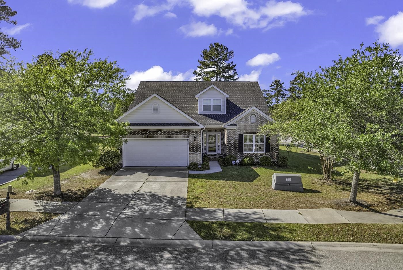 5 bedroom 3 bath desirable floor plan home with a variety of living options (great multigenerational home)- situated on a large corner lot overlooking pond/fountain in desirable tiger grand in conway.  desirable first floor living offers 3 bedrooms, including the primary bedroom, along with 2 baths, great room, kitchen, dining, and laundry room on the first floor. upstairs, there are 2 bedrooms, a full bath and a media room/loft. upstairs offers a lot of privacy and can be used in many ways from an in-law suite with the media room/loft being used as a living area. it could  be a great workout room, movie room, play room, or office. downstairs also offers privacy with primary bedroom at the rear of the home and the other two bedrooms just off of the foyer and sharing a full bath. front bedrooms would be ideal for a den, office and much more. primary bedroom has a 5 foot shower, double vanity raised height sinks, a linen closet and a large walk-in closet. kitchen features breakfast bar, maple cabinets, a pantry, stainless steel appliances and a pond view from the bay window- just off of the dining room.   lots of storage with pull-down attic in garage and upstairs storage, irrigation system, and water softener.  ceiling fans w/ light kits in all bedrooms and living room. 2 hvac units to keep both levels of the home efficiently heated and cooled. 22' x 21' garage. enjoy relaxing on your covered porch and watch the sunset over the caribbean blue pond and fountain near the entrance of the community. convenient location with wal-mart and aldi just around the corner - less than 1 mile; downtown conway is just 4 miles away where you can enjoy the riverwalk, waccamaw river,  park, and theatre. bingo, recreation dept, gym, and many restaurants within a couple of miles. if you want to go to the ocean, myrtle beach is just a 15 minute drive.  owners in tiger grand enjoy beautiful lake views, walking trails, a low monthly hoa fee, and convenience !!! home comes with a 1 year home warranty so you have peace of mind when it comes to hvac, plumbing, appliances, and much more!!! square footage is approximate and not guaranteed. buyers responsible for verification.