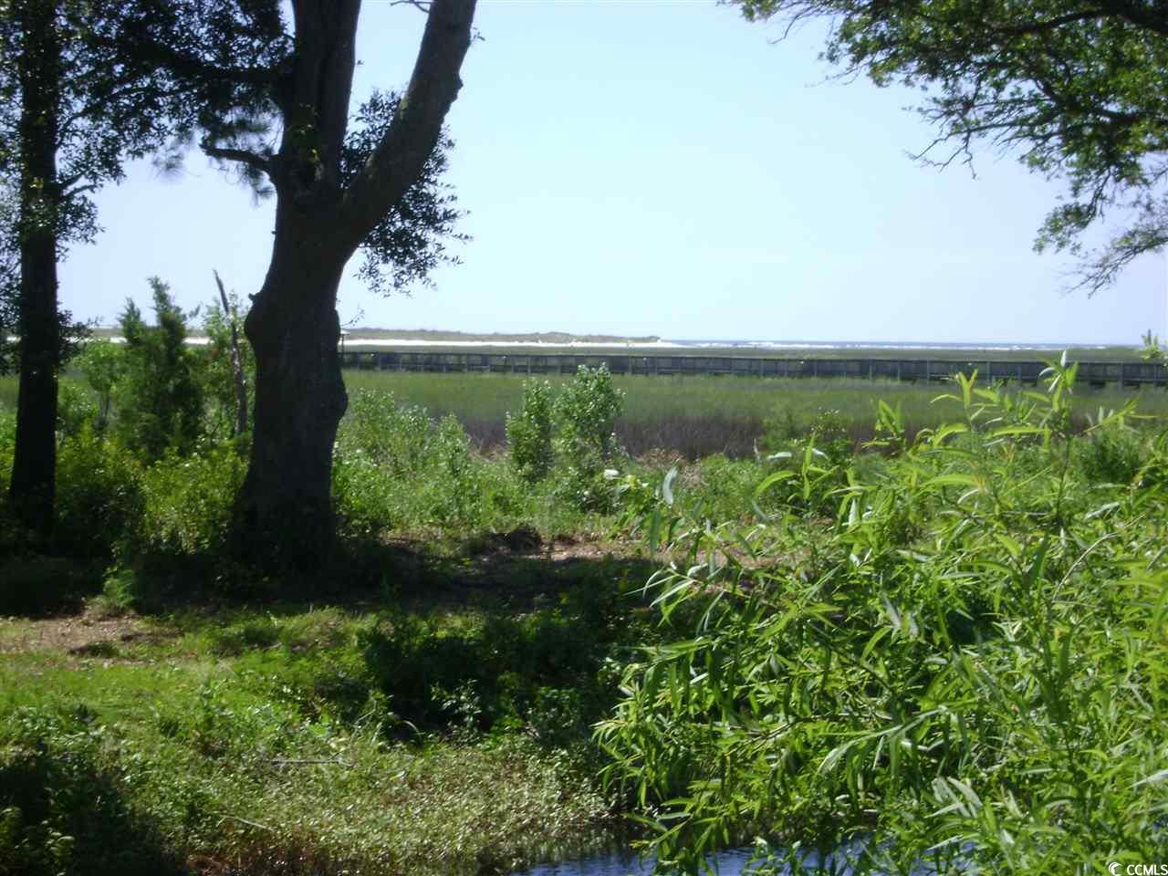 beautiful inlet creek view with views that extend to the ocean.  what a great lot to build your dream home on, and have fantastic sunrise views.