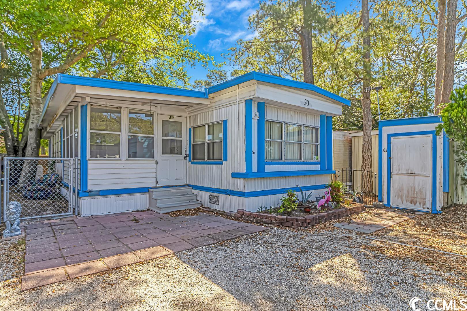 motivated seller. prime location, location, location, in the heart of north myrtle beach, east of hwy 17!!! this charming 2 bedroom/1 bathroom manufactured home on leased land is centrally located in the windy hill section of north myrtle beach. open the door to a tiled carolina room, then enter the property to an open concept living/dining/kitchen and fresh paint throughout. washer and dryer convey and are within the home. close to barefoot landing, restaurants & steps to the beach. lot lease includes: water, trash, sewer, cable & lawn maintenance. great vacation home, primary residence or rental property! won't last long, schedule a showing appointment today! all measurements are not guaranteed, buyer responsible for verifying.