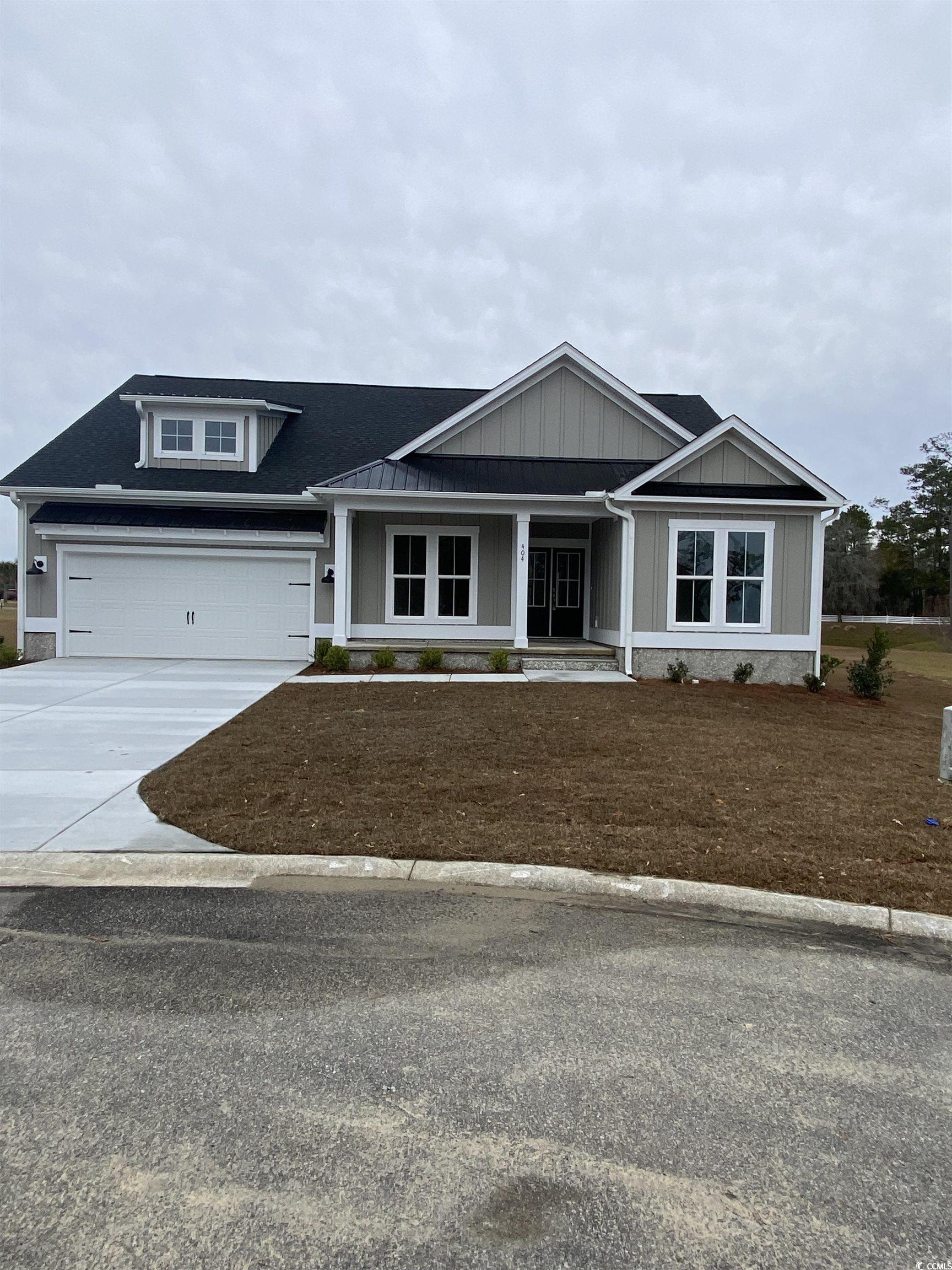 beautiful home to be built in south island plantation on a lake with beautiful views.  south island plantation is located on the winyah bay in georgetown.  a peaceful gated community with plenty of amenities such as a community pool, club house, community day dock and a beautiful walking path, all located just minutes from georgetown's historic waterfront and approximately 12 miles to the closest beach.