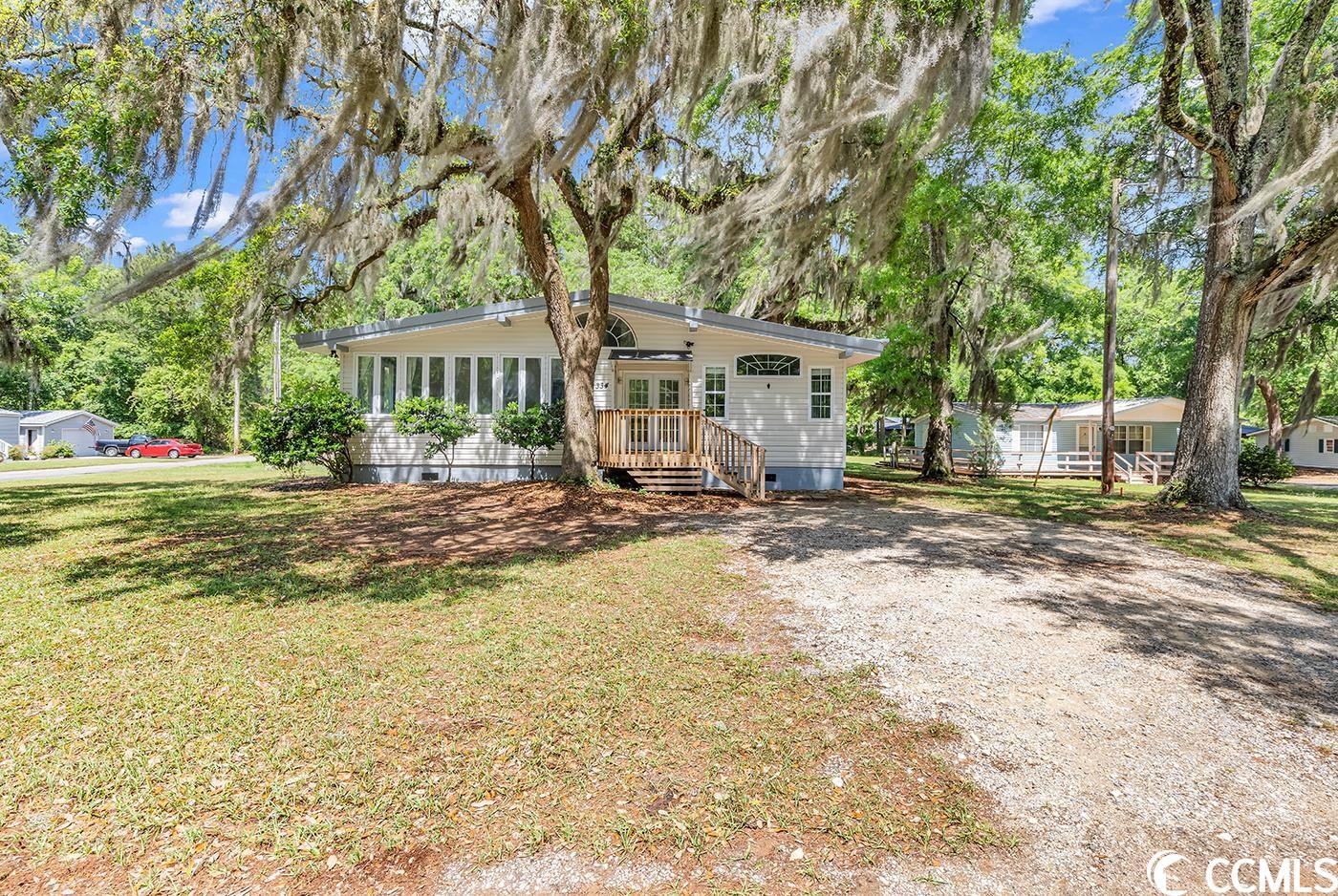 welcome to this totally renovated, adorably appointed beach house style cottage.334 archer is situated on a corner lot with beautiful oak trees and has been renovated from top to bottom with amazing attention to detail. this home offers a traditional beach house style floor plan with open kitchen and living area in the center of the home with bedrooms on either side. ``