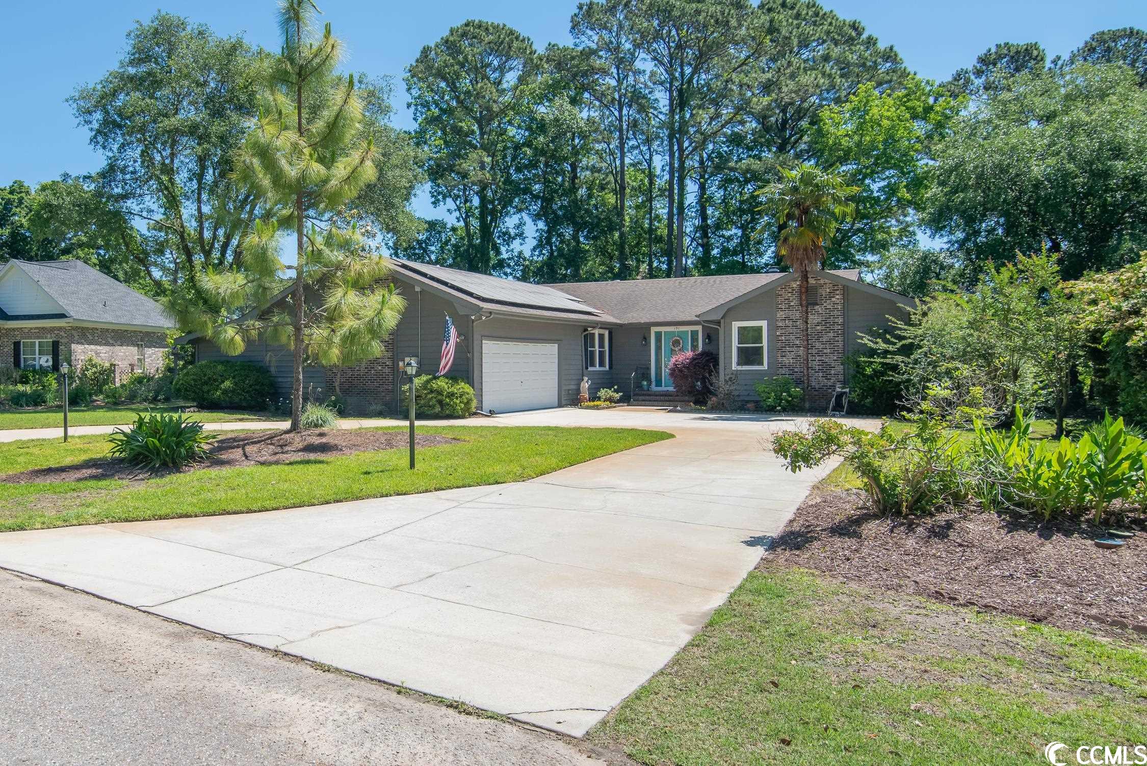 welcome to 191 goodson loop, a beautiful 3-bedroom, 2.5 bathroom home located in the desirable pawleys island community of sc. this stunning single-family home offers approx. 2,400 square feet of living space and features an open floor plan that's perfect for entertaining guests and relaxing with family.  as you enter the home, you'll be greeted by a spacious living area with soaring ceilings and large windows that let in an abundance of natural light. the living room also features a cozy fireplace, perfect for chilly evenings. the adjacent gourmet kitchen is a chef's dream, boasting stainless steel appliances, granite countertops, and a breakfast bar for quick meals on the go.  the master suite is a retreat, complete with a spa-like en-suite bathroom with dual vanities, and a separate shower. the two additional bedrooms are spacious and well-appointed, each featuring ample closet space and large windows that let in plenty of natural light.  additional photos coming soon.  outside, you'll find a landscaped backyard with a patio and deck, perfect for outdoor dining and entertaining. the home also features a 2-car garage and a laundry room for your convenience.  located in the highly desirable community of pawleys island, this home offers easy access to pristine beaches, championship golf courses, and a variety of shops and restaurants. come see for yourself why pawleys island is one of the most sought-after locations in south carolina. schedule a tour of 191 goodson loop today and make this stunning property your forever home.