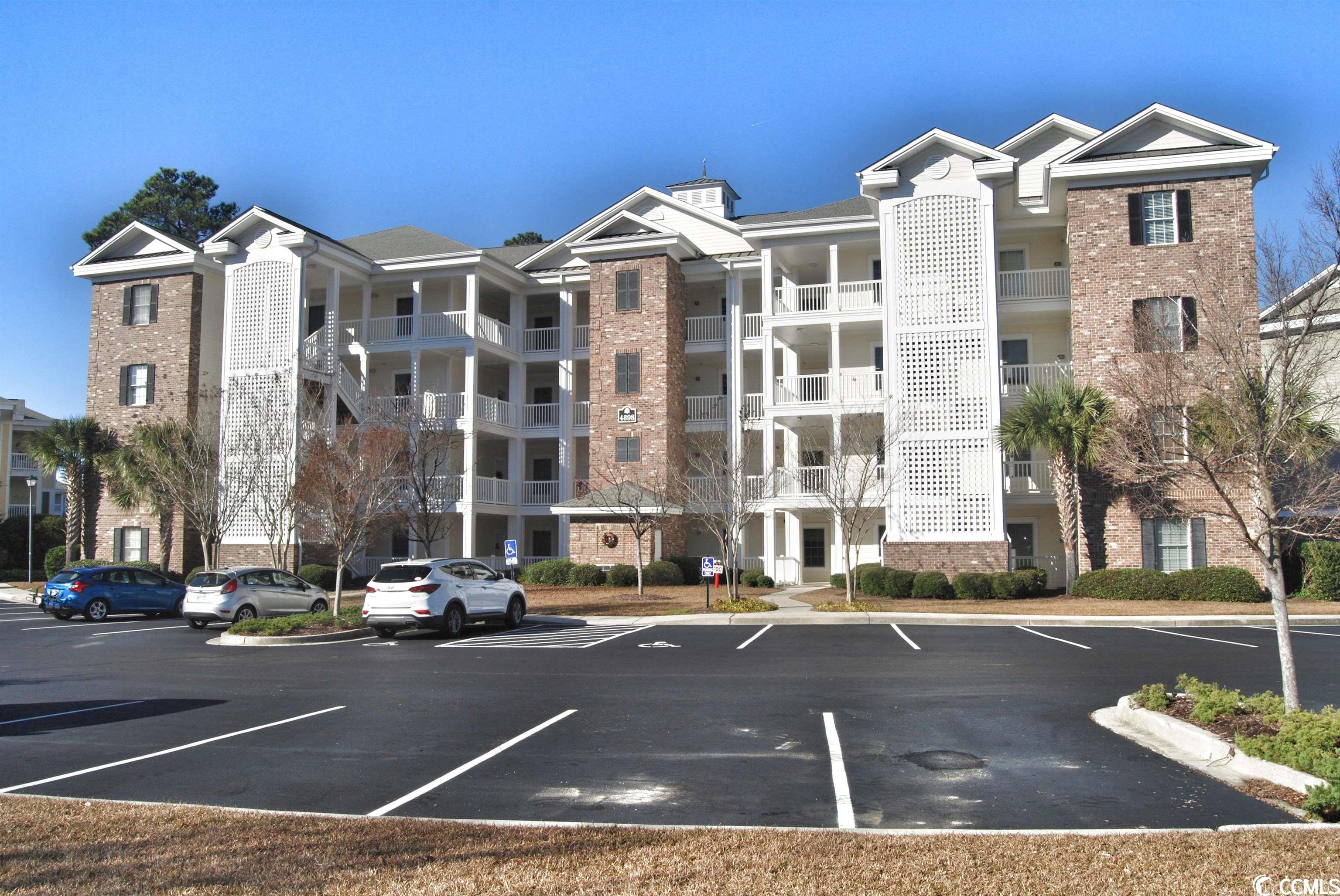 this is a 3 bedroom 2 bath condo located adjacent to myrtlewood golf course. magnolia pointe, is sought after for its location and lifestyle. you are less than a 3 minute drive to the beach, dining, entertainment, and broadway at the beach. this is one of the few complex that offers elevator services. this unit has been a second home to a wonderful family that now is looking to see another family create priceless myrtle beach memories for their family. the unit is painted a soothing sherwin williams sea salt that coordinates perfectly with any beachy decor. the hvac and hot water heater have been replaced in the past 3 years. the convenience of this first floor unit makes it extra desireable. from the time you come in the door you are amazed by the spacious open floor plan. the condo is so thoughtfully layed out to provide the maximum amount of privcay. the backporch has been converted into a four-season rooms that gives you year round enjoyment of this space. conveniently walk out to enjoy the sprawling community lawn and adjacent pool just steps from your back door. this unit will not disappoint. it is upfitted with two king size beds and two twin beds. don't miss out on your opportunity to own this gem.