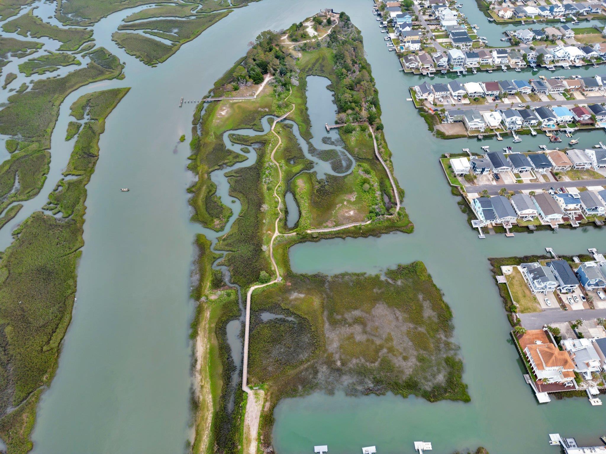 rare opportunity to own part of an environmental sanctuary located in the heart of cherry grove.  13 lots are being sold together.
