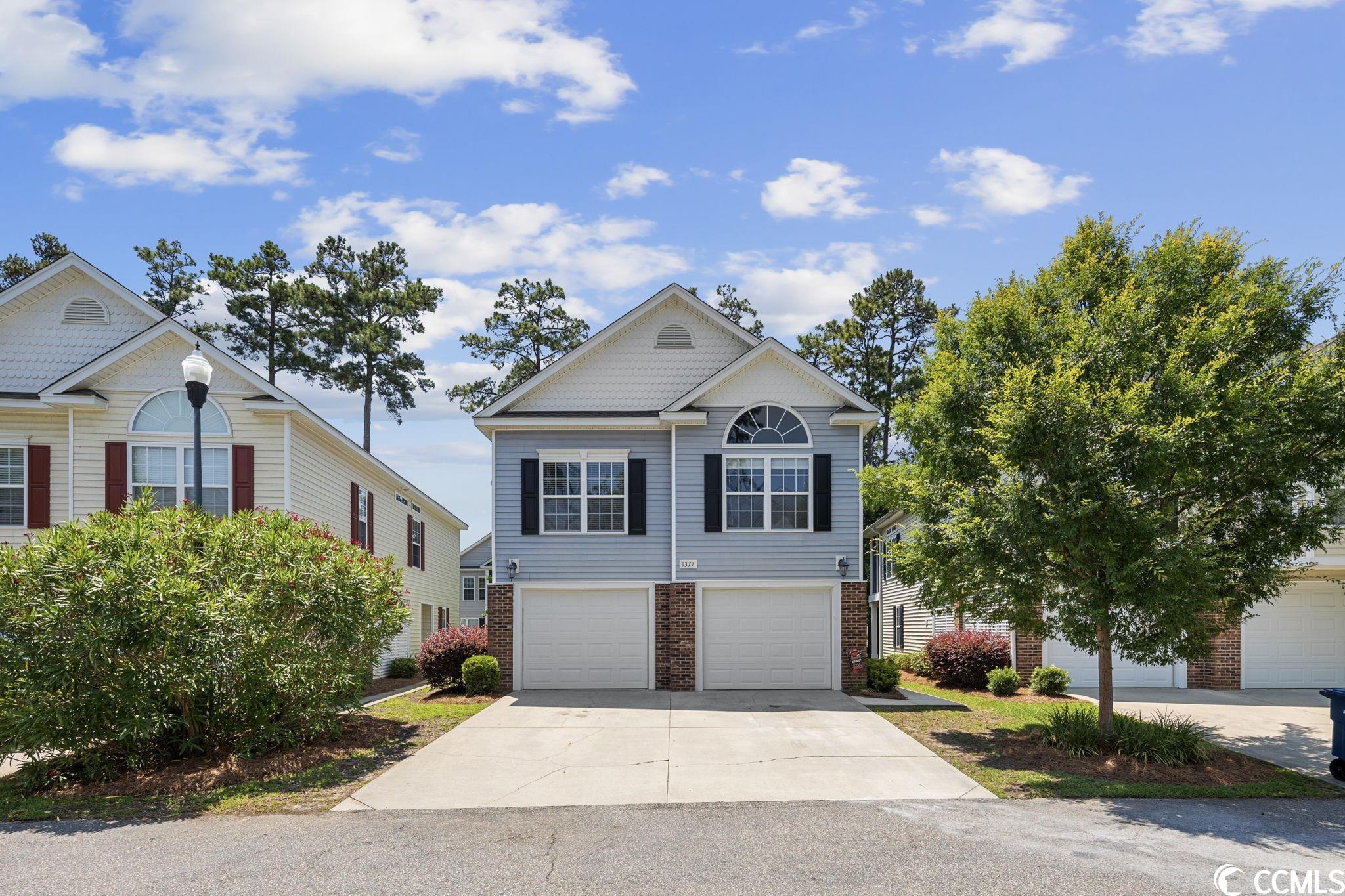 you found it in this partially furnished 4 bedroom 3 bath home located in the well sought after cottages on farrow parkway community of market common. the main living area boasts open concept with vaulted ceilings, crown molding, and recessed lighting. natural light pours throughout the entire space. there is also a covered balcony off of the living/dining room with a ceiling fan perfect for relaxing with a morning cup of coffee, good book, or an evening cocktail. the kitchen has 42" wood cabinets, stainless steel appliances, and breakfast bar. off of the main living area is the master suite, and an additional bedroom. the master suite also features plenty of natural light and vaulted ceilings with a large walk-in closet. master bath has a large vanity and a generously sized shower. there are also 2 additional bedrooms located on the 1st level with another full bathroom and laundry area. this is perfect for an office area, entertainment space, play area, or out of town guest privacy. there is a walk out, covered patio with access from one of the 1st level bedrooms, with views of trees, and a walking path. there is an additional storage closet inside the enlarged 23x24 garage. the cottages on farrow parkway neighborhood showcases a community pool, guest parking areas, and walking paths throughout. the market common area features plenty of shopping, dining, movie theatre and other entertainment options. guest parking a few short feet from the home. all this and just a short car ride away from the atlantic ocean.