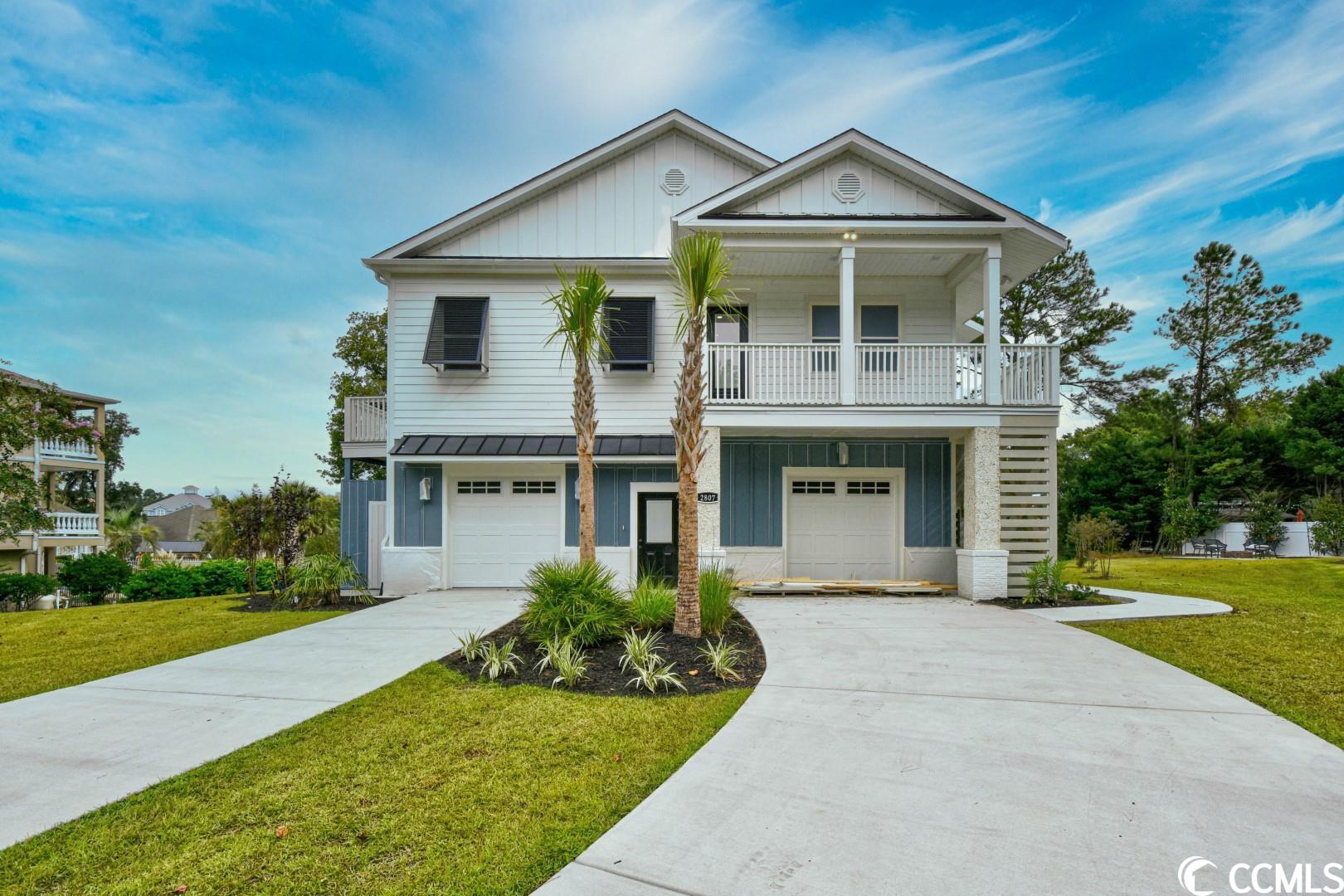own a piece of paradise in a fabulous waterway community with no hoa, close to the beach and all area shopping! this new construction custom 5br/4.5ba home leaves out no detail & the finest workmanship. the ground level boasts a great next gen suite with a living/dining/kitchen combo, high ceilings, large bedroom, walk-in closet, full bath with beautiful tile shower & oversized walk out porch. 2nd level is bright & airy with open kitchen, large island, stainless appliances including a built in drawer microwave and opens up to a beautiful living space with lots of room for entertaining & another oversized walk out porch. the owners suite is a dream & boasts a walk-in closet and a beautiful bathroom with tiled shower & walk out balcony to enjoy relaxing sunrises & sunsets or just chilling out with a good book. additionally there are 3 bedrooms & 1.5 baths all well appointed and nice sized. there are so many possibilities with this beautiful home...a massive garage has plenty of room for multiple cars & a boat, golf cart or jet ski's.  extensive landscaping in front and rear complementing the yard & lovely decorative retaining wall. situated with marsh views & located in an icw community close to the marina and just a short drive to cherry grove pier, the beautiful altantic ocean & 60 miles of white sandy beaches and all of the shopping, dining, entertainment, golf, area attractions and all the grand stand has to offer! whether your primary residence or your vacation get-a-way, don't miss ~ come live the dream!