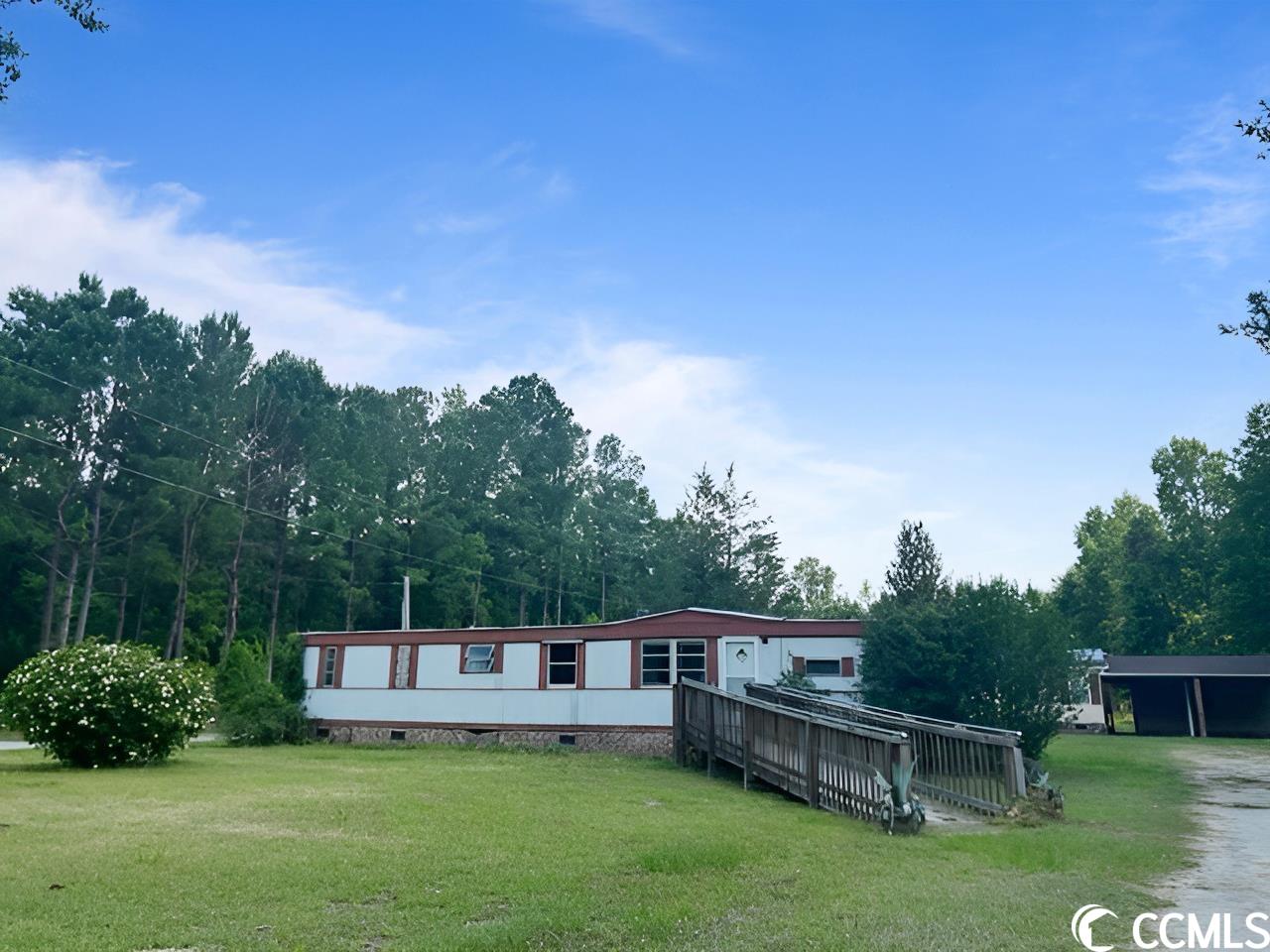 single wide 2 bedroom 1 bathroom located on large lot near downtown conway. there is also a double wide mobile home on the property also. access will not be allowed in either home due to condition. call your agent today for more details.