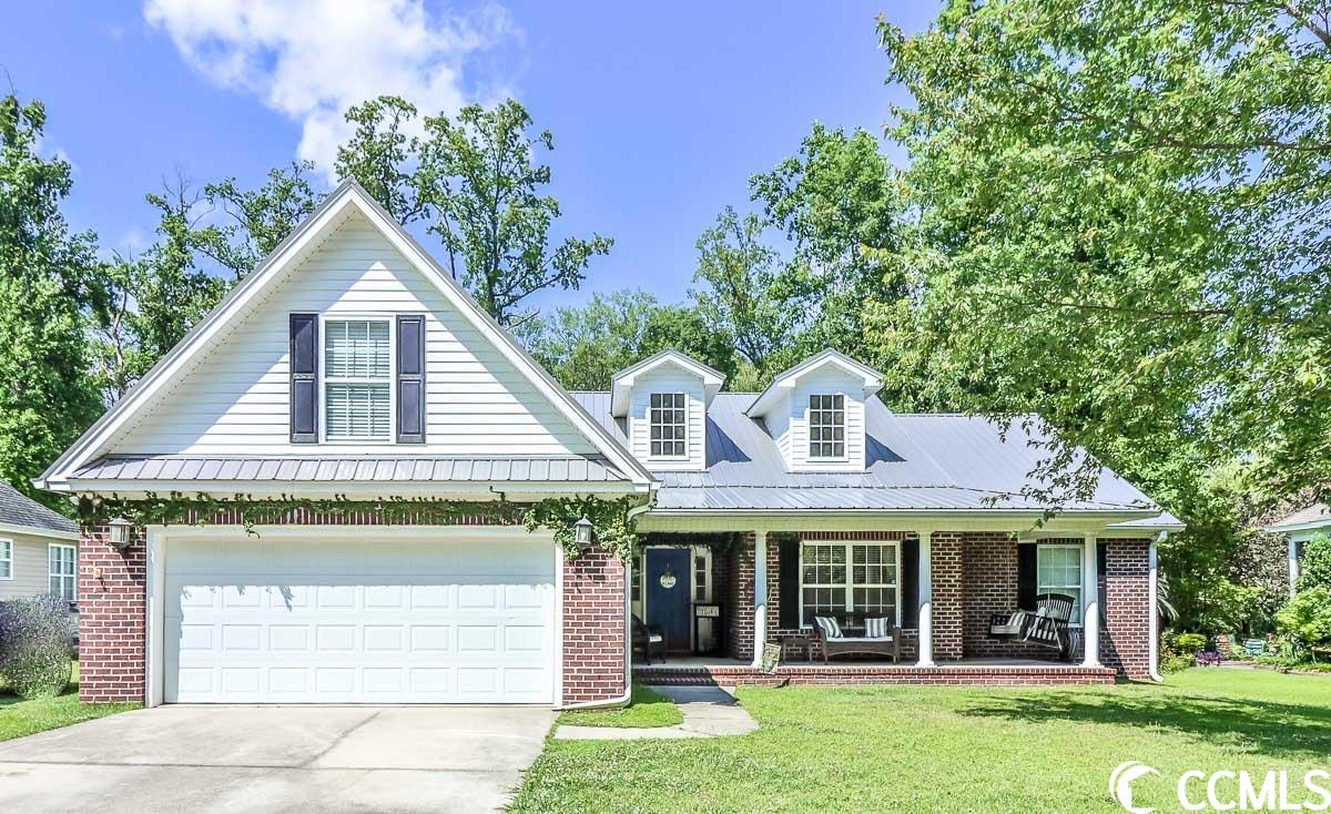 ***not in a flood zone and has a new roof***  welcome to 116 creel st in the beautiful magnolia bay community of conway! this exceptional 3-bedroom, 2-bathroom home offers a comfortable and convenient lifestyle, situated on a generous .71-acre lot with the added benefit of a low hoa. step inside and be greeted by the bright and open living room, where easy flow and abundant natural light create a welcoming atmosphere. the well-appointed kitchen boasts stainless steel appliances, elegant granite countertops, a convenient breakfast bar, a pantry, and a delightful dining area. it's a perfect space for preparing meals and entertaining guests. the master suite is a private retreat, featuring a spacious walk-in closet and an ensuite bathroom with dual sinks, a luxurious walk-in shower, and a soothing jetted tub. two additional bedrooms provide ample space for family, guests, or a home office. the home also offers a versatile bonus room above the garage, allowing for flexibility to suit your needs and a formal dining room for those special occasions. enjoy the pleasant sights and sounds of the neighborhood from the inviting front porch, a great spot for relaxation and connecting with neighbors. if you would like to enjoy the outdoors in any weather, the screened-in back porch offers a perfect retreat. the backyard provides privacy not found at any other home in the community and also features plenty of space for various activities and highlights an oversized deck, ideal for additional entertaining or creating a peaceful oasis. this community is conveniently located just off 701, this home offers easy access to the charm of historic downtown conway, where you can explore local shops, dine at charming restaurants, and stroll along the conway riverwalk. if you're a student or affiliated with coastal carolina university, you'll appreciate the short commute. additionally, the intracoastal waterway, pristine beaches, renowned golf courses, shopping centers, dining establishments, and entertainment venues are all within a short drive. book your showing today!