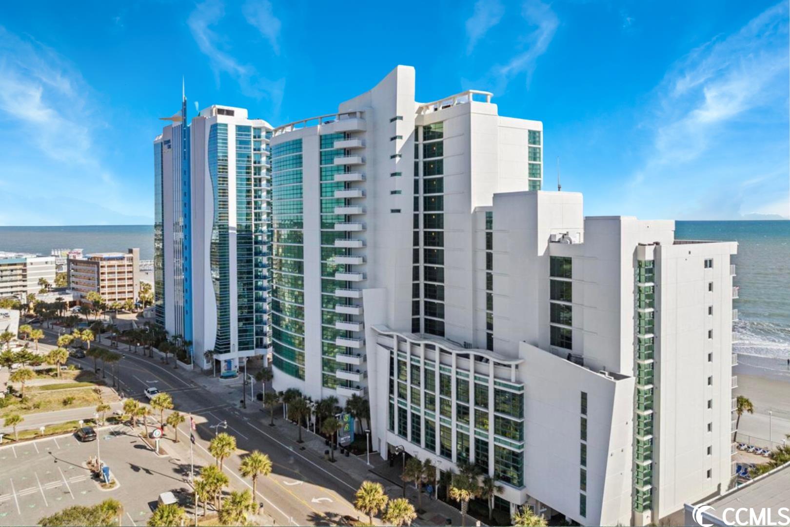 unlock an exceptional opportunity to maximize your returns with this prime oceanfront 3 bedroom, 2 bathroom condo in sandy beach resort. with its unbeatable location, spacious layout, higher floor views, and upscale finishes, this condo checks all the boxes! from breathtaking direct oceanfront views to a strong rental potential, this condo offers a seamless blend of luxury and financial gain. take advantage of the vacation rental market and secure your stake in the sought-after myrtle beach market! with three generous bedrooms, each furnished with king-size beds, this condo effortlessly accommodates up to eight guests. the bathrooms and kitchen boast elegant tile floors and sleek granite countertops, elevating the overall aesthetic and adding a touch of sophistication. the master bedroom is a tranquil retreat that offers direct access to the balcony, allowing you to wake up to invigorating ocean breezes and stunning sunrises. sandy beach oceanfront resort, located in the heart of myrtle beach, offers a range of amenities for both relaxation and fun for you or your guests. enjoy an oceanfront pool, a children's interactive pool area, and a serene lazy river. the resort also features a fully-equipped fitness center and provides free high-speed internet. year-round swimming is made possible with multiple outdoor heated pools and hot tubs. sandy beach oceanfront resort combines fun, relaxation, and convenience, making it a perfect choice for a myrtle beach getaway. don't miss out on this golden opportunity to make your portfolio shine!