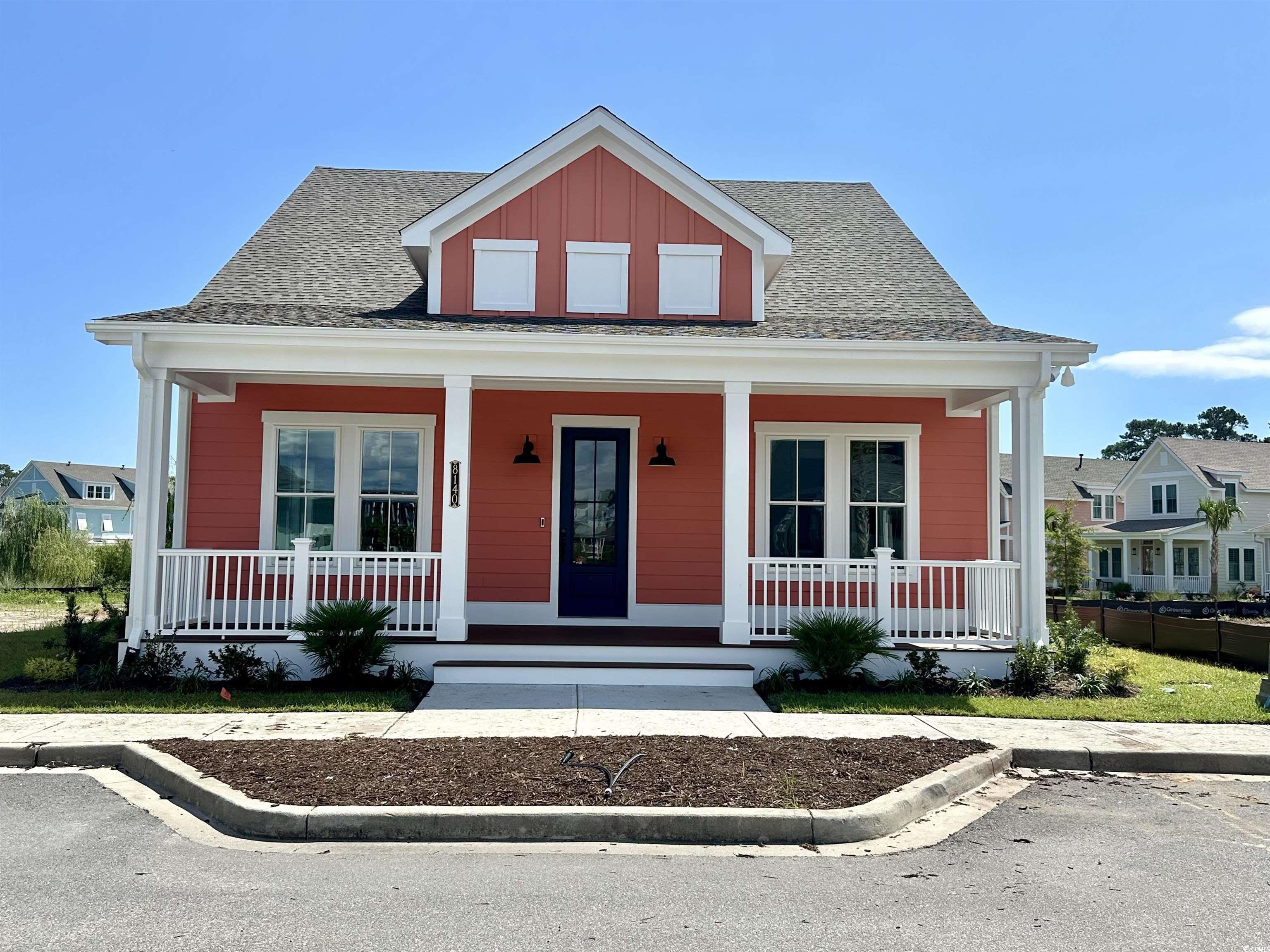 welcome home to this amazing southport plan, a to-be-built one story home that meets all of the requests we have heard for years!  architecturally designed to embody the old south, with 10' tall ceilings, this 3 bedroom, 2 bath home speaks of relaxation and warmth with ample spaces for your family to enjoy each other’s company. retreat to the master suite, which speaks of privacy and elegance with tray ceilings, walk-in his and her closets and a master bathroom, featuring fully tiled shower and private water closet.   two guest bedrooms provide added flexibility with the option to use the front bedroom as a cozy den or office space. the attached 2 car garage is a large 24'6" x 23'10".  feel free to grab your favorite drink and make yourself comfortable in the back yard with views of weeping willow trees on the lake's edge and soothing sounds from the fountains.   come live the grande dunes lifestyle at living dunes in our new construction homes with lakefront, water view or private perimeter homesites available. located on the north end of myrtle beach, less than 1 mile from the ocean, living dunes features low-country style single and multi-family homes constructed by locally renowned, crg companies. our homes are built with elevated materials and practices that surpass regulations allowing you to own a quality home that is energy efficient and eco-friendly. our kitchens feature designer quality elmwood cabinets, with soft close doors and drawers, cove crown molding, and a light rail with under cabinet led lighting.  in our list of standard specifications are quartz countertops, tile backsplash, stainless steel appliances, 2 x 6 construction, impact resistant windows, natural gas, rinnai tankless water heaters, icynene spray foam insulation and cutting-edge home technology. additional upgrades in this home include authentic reclaimed wood flooring, a cafe wood island countertop, frameless shower enclosure and much more.  as myrtle beach’s first gigabit community, living dunes provides residents with internet connections 100 times faster than the average, meaning more time spent doing what you want. residents have superior on-site amenities with a zero-entry free form swimming pool. that offers a tanning shelf, well-appointed clubhouse, miles of walking trails, 10 acres of lakes, and green spaces. thoughtful design and unprecedented amenities, the community’s location offers convenient access to the beach, grande dunes ocean club, marina, golf courses, and several major marketplaces with groceries, pharmacies, shopping, dining, fitness, health care, salons, and more. live local, live smart, living dunes.  photos shown are of another previously built southport plan with various upgrades and not the actual home for sale as this listing is a under construction home.
