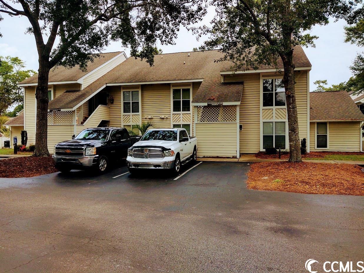 schedule today to visit this 1st floor condo in a desirable location! this property has been in the family since 1988 and has not been a rental unit. the recently purchased sleeper sofa in the living area pairs nicely with the two recliners, while providing more space for guests. enjoy the relaxing screened porch which allows you access to the outdoors! this community features two outdoor swimming pools, a hot tub, and tennis courts. just pack your swimsuit and enjoy the community pools, or the beach that is only 3 miles away!