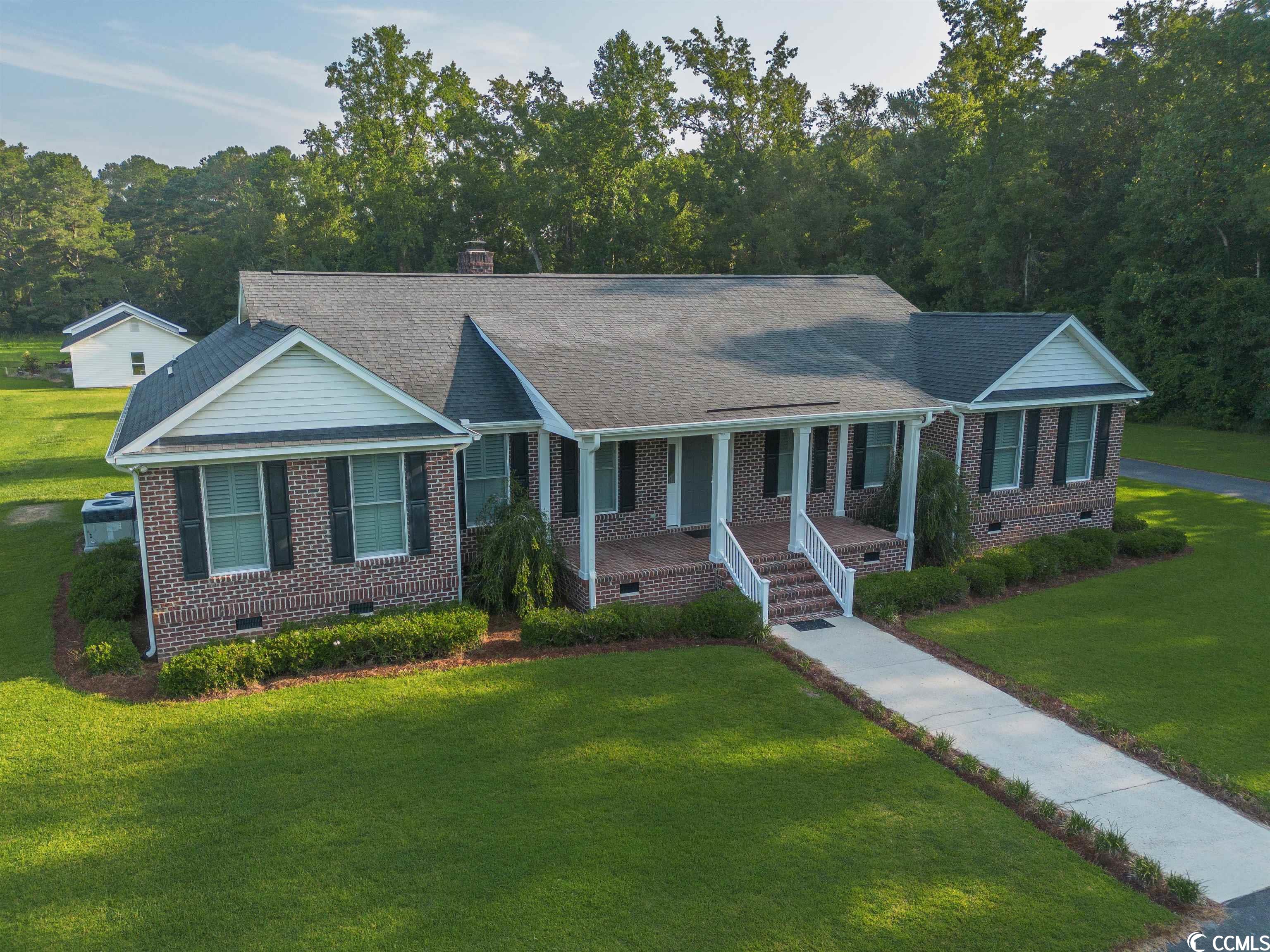 rarely do you find listings like this !!  located in the heart of horry county - with options  - & more options ! this listing offers many opportunities... for the outdoorsman, the horse enthusiast ! - a wonderful family home ! -or the retiree and investor looking towards the future.  -  you can enjoy having a rural setting & myrtle beach & the grand strand is a short distance away with easy access to major road arteries.! park an rv - build a shed for it - or a boat.  these can be some of your options.  with a 3,000 + square foot custom brick home - with an attached oversized 2-car garage and upstairs office or workout bonus room - a detached combination of enclosed & open shed with 3 garage bays for auto storage/ boat storage or many other items!   the custom designed brick home features easy flowing space -recently remodeled!! -with many updates.!! enter at the front foyer- step into the open living areas or turn into a formal living room that can also be used as an office or library. continue into the formal dining room and turn into the open living areas! living space is all open to each other- kitchen, breakfast area, den and sunroom/playroom.  9 foot ceilings, large bedrooms, built-in shelving & cabinets throughout den & potential sunroom/office area.  hunt room/safe room has 8 inch block walls, 2 hour fire door. store hunting items or important papers. brick fireplace in den. granite countertops throughout. hardwood and luxury vinyl plank floors.   there are so many options !! - with this home & land! - come & see what it can be for you!!    there is approximately 29 acres of land with pond adjacent to this home - seller is willing to sell additional acreage if you would like to have more property beyond the approximately 2 acres included.! mls#2316290  measurements are approximate  - buyer responsible to verify. listing agent related to seller.