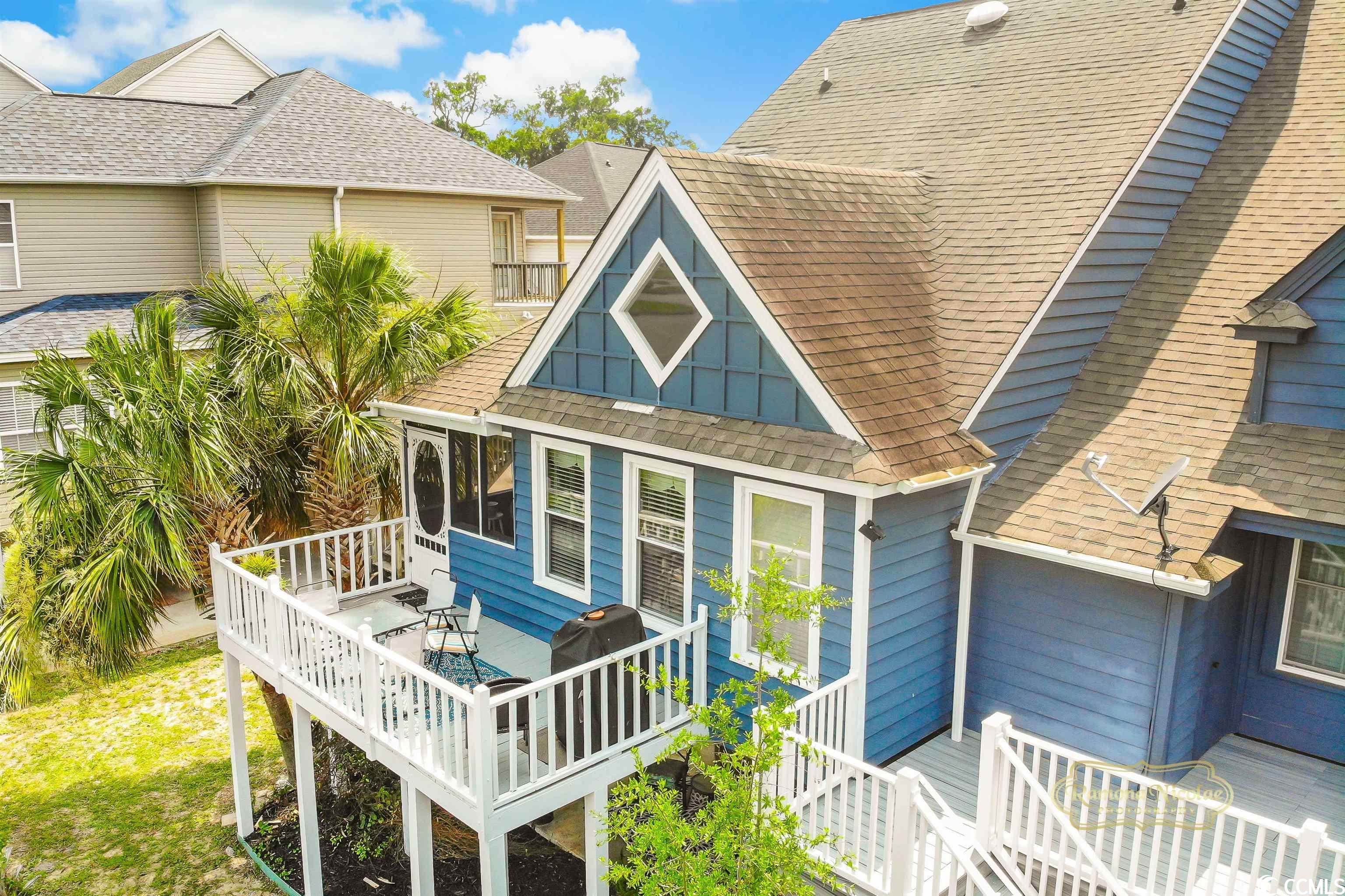feel the ocean breeze as you're overlooking the marsh and big channel all the way to the ocean from this cherry grove beach town home! raised beach house style. come into the gracious, well maintained living area with vaulted ceilings designed for family and friends to get together for time at the beach. the large open kitchen features a breakfast bar, and so much cabinet space to make any cook happy.  the open living area opens to the carolina room with lots of natural light,  shaded by palms, panoramic direct marsh and inlet views stretching to the ocean. the large open deck is the perfect place to grill outside, feel the fresh salt air, and relax watching pelicans fly and catch fish. enjoy the beautiful pool before or after beach time! outside shower, too.full size washer and dryer, large closets, covered parking for your cars and golf cart, exterior storage for your beach chairs and fishing gear. the atlantic ocean along the south carolina coastline is a few blocks away! take a walk, ride your bicycle, or golf cart through the heart of cherry grove beach in north myrtle beach, sc. this great property is the beach house, primary home, second home, or investment you're looking for.  minutes to world class shopping, dining offering succulent fresh seafood, amusements, nightlife, live entertainment, theaters, marinas, nature parks, deep sea fishing, boating, watersports, sports complex, everything the grand strand and myrtle beach area offer!