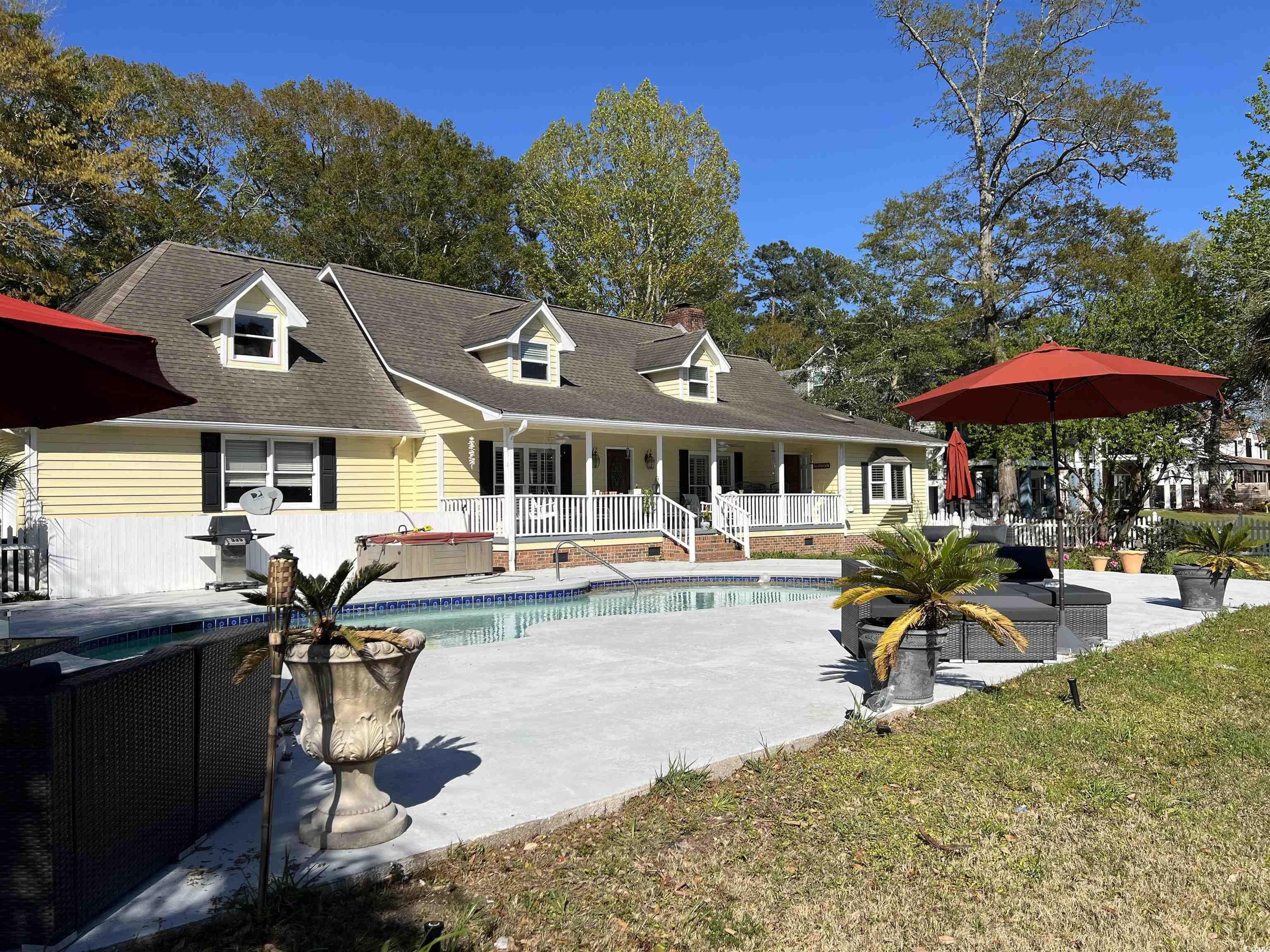 this stunning, one-of-a kind, two story home on the intercoastal waterway is a beautiful and well-built classic home which will not last long in this competitive market.  it is a sturdy and lovely cedar sided 3000+ sq ft home with 3 bedrooms, a first floor master bedroom, and 2 full baths and 5 half baths.  it has an upstairs game room complete with pool table along with 2 bedrooms, 1.5 bathrooms.  it has a natural gas equipped kitchen with very well-made real wood cabinets and tile floors.  it has concrete driveway with 2 separate garages, one of which could be used for a workshop.  it has a riverfront wood deck which is great for fishing and a boat dock.   the front yard also features a gorgeous riverfront full-size concrete pool and patio deck. the home is built on the largest lot in this very quaint and friendly neighborhood with no hoa and the yard with many trees and natural foliage.  it is truly a once in a lifetime opportunity to own this beautiful riverfront home as they certainly don’t make them like this anymore.   laundry room with a walk-in closet and half bath.  outside half bath on the front porch.  porch has two fans and overlooks the pool and the waterway.  two central heating units with separate units for the upstairs and downstairs.  front yard fenced in.  buyer to verify all information