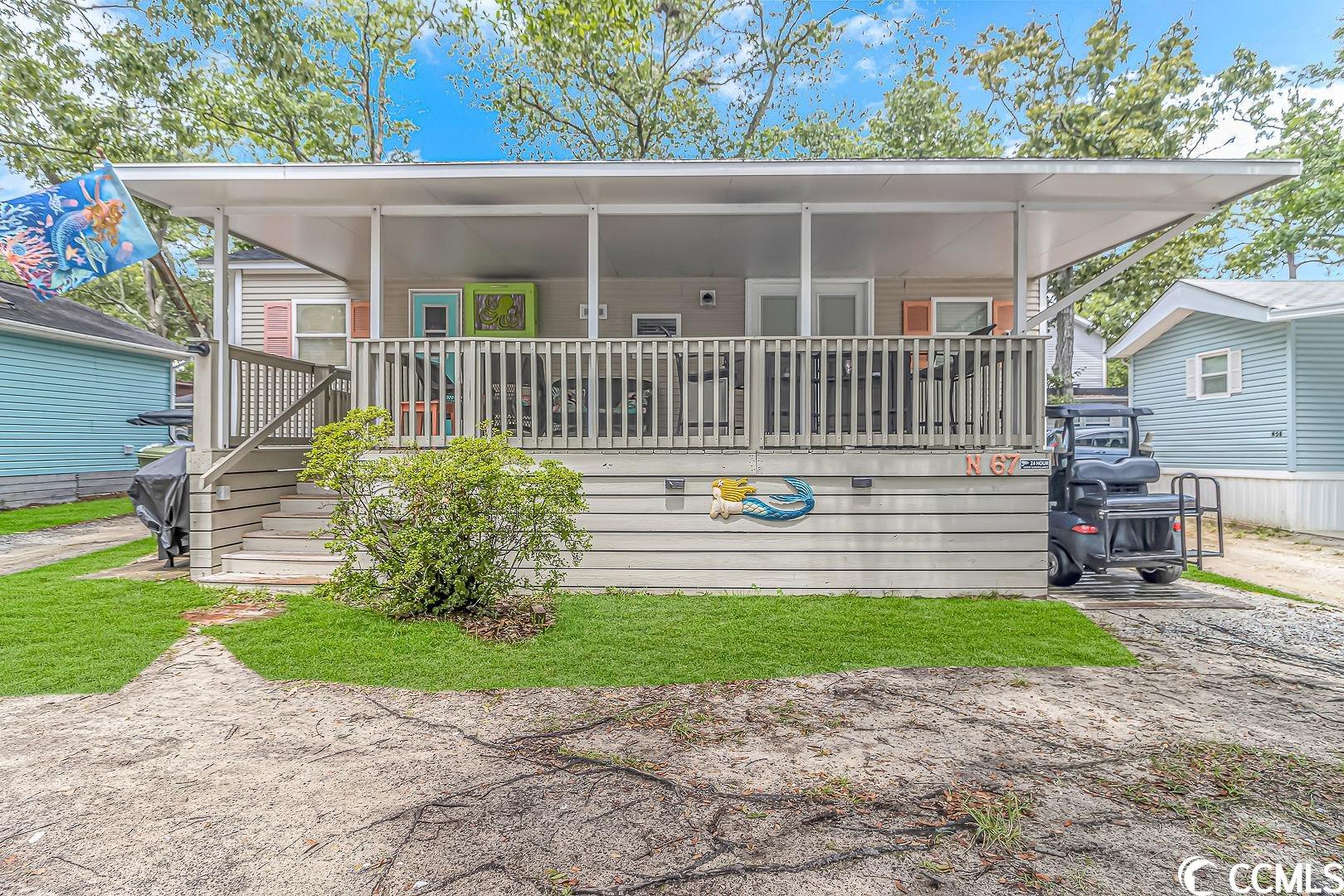 living is easy in this impressive, generously proportioned tiny home located in the award winning ocean lakes family campground. perfectly situated right in the heart of the campground, walking distance to the waterpark, and a covered outdoor area, this home truly has it all. as you enter the home you're greeted by an open concept living space that is directly open to the beautiful kitchen. with one bedroom, one bathroom, there is plenty of space for everyone. coming fully furnished, so all you will need is your suitcase here at site n-67 in ocean lakes. home is conveniently located close to all the amenities that comes along with ocean lakes family campground. amenities included are indoor/outdoor pools, lazy river, waterpark, mini-golf, arcade, basketball courts, volleyball courts, and much more! come check out this property today! all measurements approximate and not guaranteed. buyer is responsible for verification.