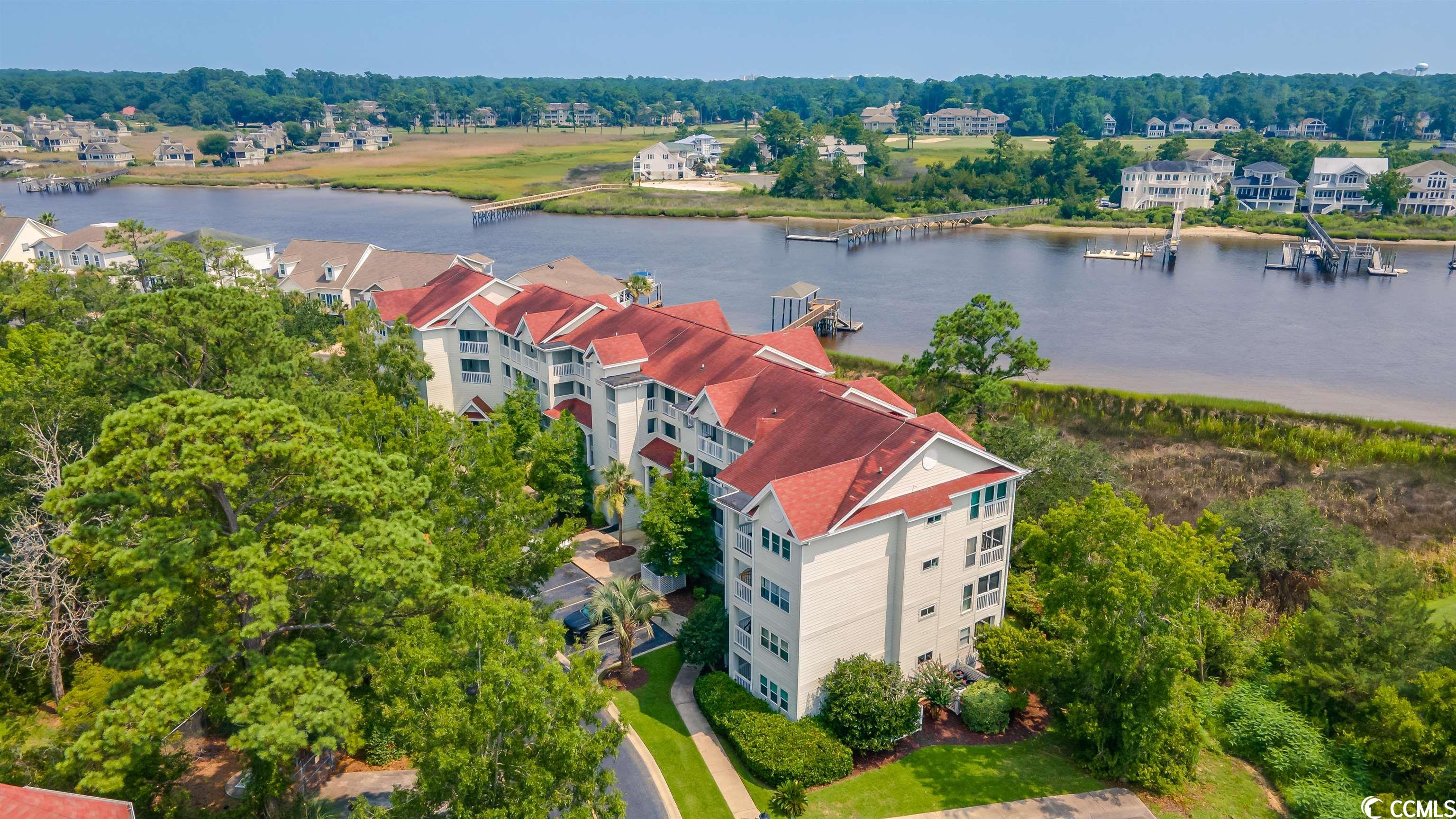 indulge in this stunningly remodeled and upgraded, 2-bedroom, 2-bathroom unit situated along the picturesque intracoastal waterway (icw). the first-floor location offers convenience and easy access. no expenses were spared in the transformation of this exceptional condo. step inside to discover a new kitchen boasting exquisite cabinets, a refrigerator, range, microwave, dishwasher, backsplash, and elegant quartz countertops.  throughout the unit, you'll find new fixtures that add a touch of elegance. the master bathroom has been remodeled with a gorgeous tile walk-in shower. fresh paint, tile, and luxury vinyl plank flooring create a modern and inviting atmosphere. situated in the highly sought-after eastport golf community, this condo requires no additional work and is only 10 minutes away from the pristine beaches of cherry grove. imagine starting your day with a cup of coffee or winding down with a cocktail on your screened porch, overlooking the scenic intracoastal waterway as boats sail by. whether you're seeking a primary residence or second home, this condo is perfect for any purpose. as a resident, you and your guests will have access to the community pool, enhancing your leisurely lifestyle.  additionally, the valley at eastport golf course provides an opportunity for avid golfers to pursue their passion. little river's prime location ensures easy access to a myriad of attractions, such as the vibrant myrtle beach, cherry grove, tanger outlets, marinas, public docks, landings, restaurants, championship golf courses, shops, and entertainment options. moreover, it's just a quick 10-minute drive to north carolina, expanding your horizons even further. square footage is approximate and not guaranteed. buyer responsible for verification.