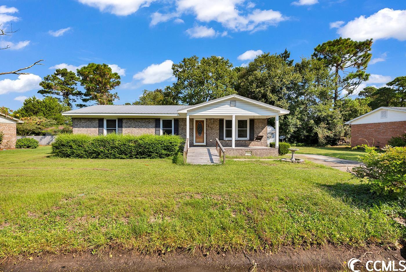 great opportunity for an investor or someone with vision! this cozy 3-bedroom ranch is in the perfect location for an easy commute to the beautiful sandy beaches of myrtle beach. conveniently built close to both coastal carolina university and horry georgetown technical college .the open floor plan provides a spacious entertainment area, great for movie nights or "get togethers". the home features upgraded windows and a metal roof that were both installed less than 5 years ago. this lot offers a fenced in yard that would be great for summer barbecues or a place to relax outside unbothered. there is a large shed at the end of the driveway that gives additional storage outside. perfect for a quick flip, rental investment or to make your home sweet home!