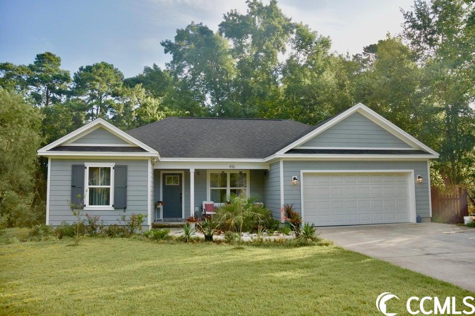 the peaceful neighborhood of maryville provides all the best of georgetown: a community integrated with its schools, walkable to the shoreline of the expansive winyah bay, while also bicycle distance to all the happenings of downtown georgetown's front street. this adorable and well-kept home has plenty of breathing room: an open kitchen and living room with the owners suite opposite from the two additional bedrooms, which share a  hallway full bathroom.  from the living room watch the sunset or escape out to the grilling deck to observe the wildlife of the lowcountry nesting in the intimate backyard pond. kitchen is well appointed, and ample closet space in all three bedrooms. easy living in maryville, coming home to a charming house with room to grow and garden.