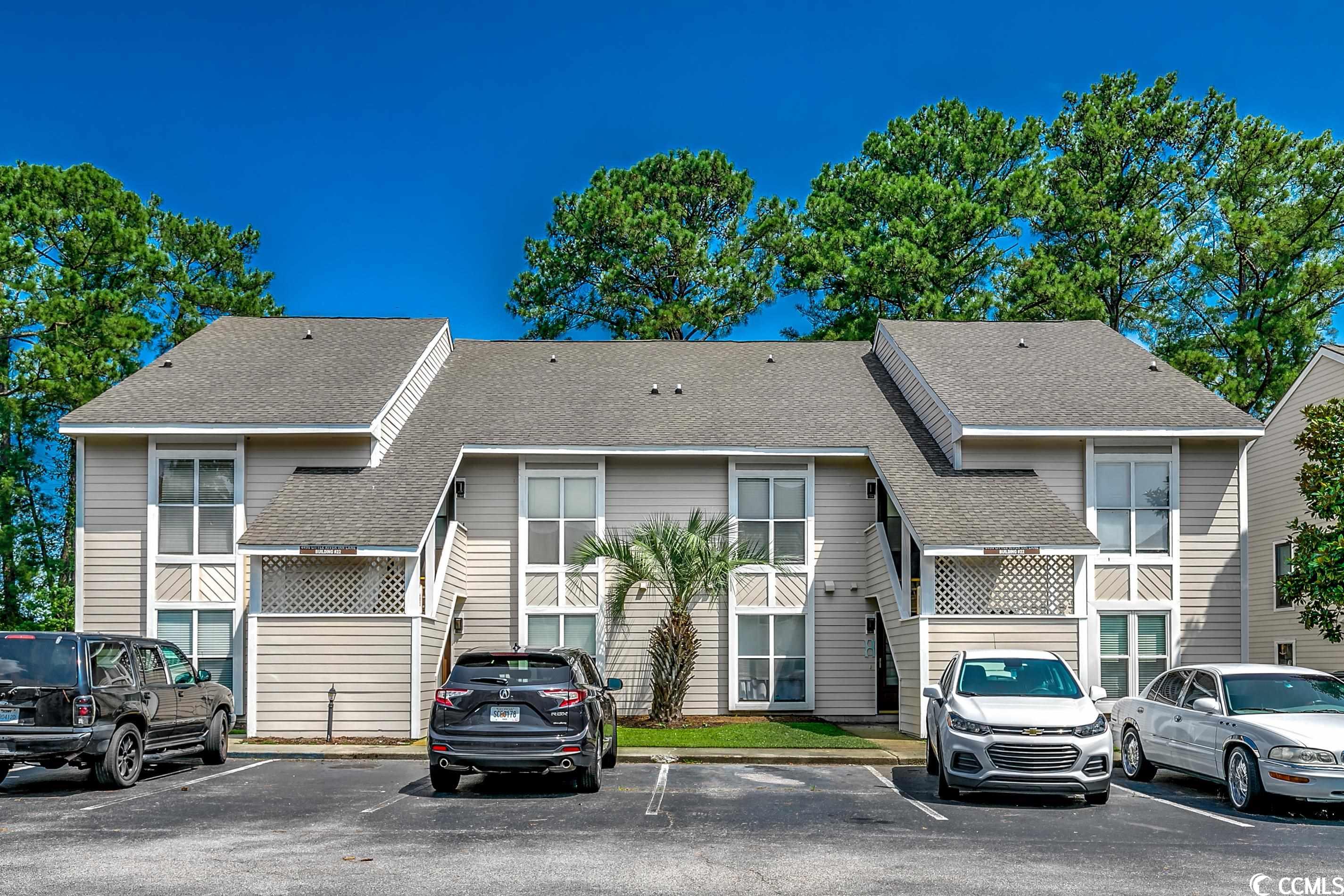 this well cared for 2-bed/2-bath end unit condo features a large covered balcony facing the trees, allowing for a serene setting for sipping your coffee, enjoying cocktails or just relaxing after a day at the pool or beach. this condo has been updated to remove all the carpeting and replaced with wood floors, except on the stairs leading up to the master loft. the kitchen has an island countertop that opens up to a bright and airy living/dining area with vaulted ceilings, skylights and a ceiling fan. a real bonus is the extra storage room (5.6 x 4.8) off of the living area, which is great for storing holiday decorations. down the hall is a bedroom with a separate full bathroom with tub/shower combo. when you go upstairs to the master loft you will find an area at the top which is great for a small office. the upper level master bedroom overlooks the living area from above and has a ceiling fan and built in book shelves, which is great for additional storage. the master bathroom has double sinks and tub/shower combo. there is large extra storage area located off the master bathroom. the washer and dryer is located on the first floor. besides being freshly painted, this seller replaced the hvac and skylights in 2021 and the slider door/window in 2022. this community offers two pools and tennis courts, trash services, landscaping, pest control and community maintenance! low monthly hoa. this condo is located minutes to area beaches, shopping, restaurants, mcleod seacoast hospital, casino boat, golf courses, and much more. this condo is move-in ready and would be a fantastic primary, vacation or investment property. don't miss out on this great opportunity to live so close to the beautiful atlantic ocean beaches at an affordable price.