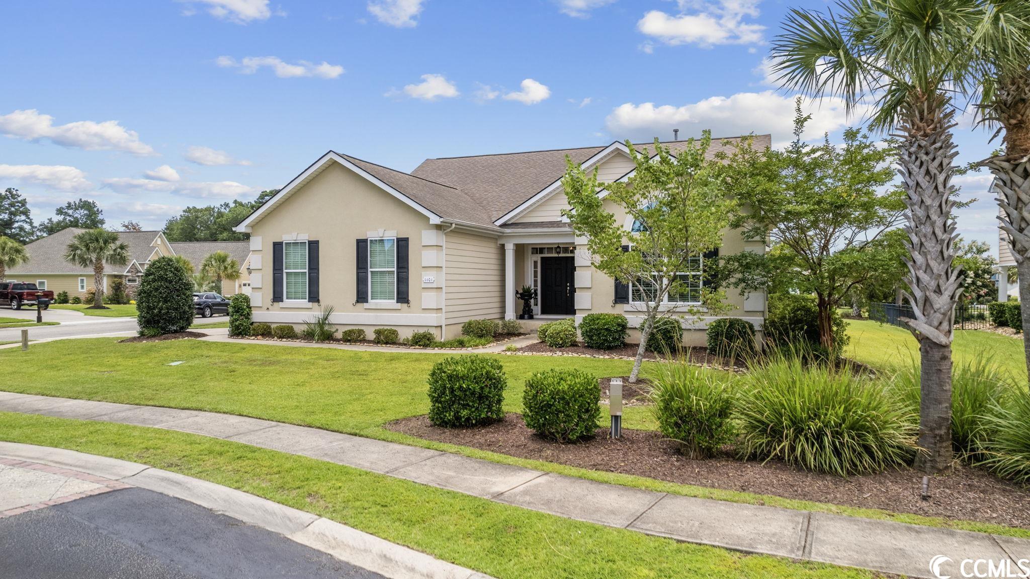 Absolutely stunning home in one of North Myrtle Beach's premier communities!  Prime location, just a quick golf cart ride to the oceanfront and minutes to popular Cherry Grove Beach with tons of shopping and dining options nearby.  Convenient floor plan with single level living; without stairs!  Three bedrooms, two and a half baths and over two thousand square feet.  Generous open concept feel with soaring ceilings throughout makes this home feel much larger.  The interior of the home has been completely upgraded with new on trend finishes added.  As you enter the home through the impressive front entry way, double front doors greet you for a grand feel.  The foyer opens to a combined kitchen dining and living area perfect for entertaining.  This home is filled with natural light from the plentiful large windows throughout and transom windows above. Custom plantation shutters have been added as well for a finished look.  Freshly painted throughout in a neutral creamy white and crisp white trimwork.  The kitchen has been upgraded with a large counter height peninsula bar and gleaming white cabinetry.  White quartz countertops have been installed along with a decorative quatrefoil backsplash.  Brushed gold hardware and fixtures have been added to accent the space.  Large glass pendant lights over the bar top and stainless appliances finish off the kitchen for the perfect designer look.  An eat in breakfast space allows plenty of room to gather for meals.  Just off of the kitchen you'll find a laundry room and access to the side load garage.  The open concept living room has built in shelving to display all of your decorative items.  For those cooler days, a natural gas fireplace can be used. Want to enjoy the ocean breeze, a lovely screened porch allows you to take advantage of the wonderful coastal atmosphere.  Need a space to work from home, a convenient office with french doors is just off of the living room.  The detailing in this property is outstanding with plenty of mill work, crown moldings, tray ceilings and hardwood flooring throughout.  New lighting with designer fixtures has been added in all living areas as well.  The primary suite is privately located in the rear of the home.  The en suite bath has new quart countertops and brushed gold hardware.  Cabinets have been freshly painted in a bright white.  Dual sinks vanities, garden tub and walk in shower finish off this well appointed suite.  A large walk in closet provides plenty of storage space.  Two secondary bedrooms are located at the front of the home serviced by a hall bathroom.  Both have a spacious feel with plenty of light and large closets.  The hall bathroom has been equally upgraded with new quartz countertops, brushed gold fixtures, painted cabinetry and new lighting and fixtures.  Outside, the home is well situated on a oversized corner lot.  Stucco exterior in a beautiful neutral creamy ivory and a well landscaped lawn makes this home a standout with curb appeal.  Seabrook Plantation is a gated community with a well maintained appearance throughout and lovely amenities.  Convenient access to all of North Myrtle Beach and closely situated to the new Coastal Towne Center.  Don't miss this fantastic home and schedule your showing today. All information is deemed reliable, buyer is responsible for all verification.