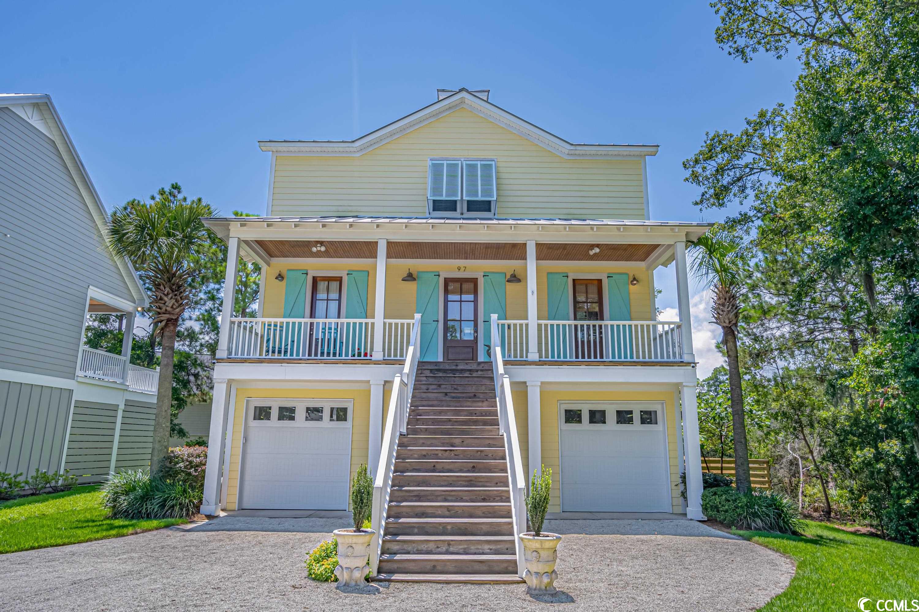 you will love this beautiful custom designed raised beach home located in the quiet seagrass court subdivision, east of hwy 17 and only a short distance to golf cart or bike ride to the beautiful pawleys island beach. this beauty sits at the end of a cul-de-sac for less travel area and situated on this professionally designed landscaped lot giving a glimpse of a sunset stretching across the marsh and coastal wetlands area as you lounge on your back porch. this hardie plank siding, metal roof and bahama shutter home was truly designed to love with touches of pickled cypress walls, heart pine flooring and pine ceilings. the ground floor offers storage bays for vehicles or golf carts and offers a heated and cooled guest suite with built in double bedding, storage space, sitting area and a full bath. guest suite has private back entrance that leads to the relaxing and enjoyable fenced back yard that host a private inground swimming pool. as you enter the foyer on the main floor off the front porch you will love the cozy feel as you notice the 10' ceilings, the crown molding and the wood staircase brighten with the natural sunlight beaming through the cupola. the kitchen is spacious with custom heart pine countertops, breakfast bar, stainless steel appliances and is open to the family room featuring a wood burning fireplace and 8' french doors leading to the covered back porch area that also host a wood burning fireplace for those late cool nights. the owner's suite is located on the main level and also features the 8' french doors that could be open so you could hear the sounds of the atlantic waves crashing in the night. the top floor has 9' ceilings with crown molding and offers two sizable guest bedrooms each with own private full baths and private balconies overlooking the marsh. there's also space for a home office or sitting area to enjoy quite time and don't let me forget there is also an elevator shaft that is now being used for storage. you would truly enjoy this coastal beach home and all it has to offer, from relaxing in your pool, or relaxing on your covered porches or just taking a golf cart ride to the beach, you don't want to miss this opportunity.