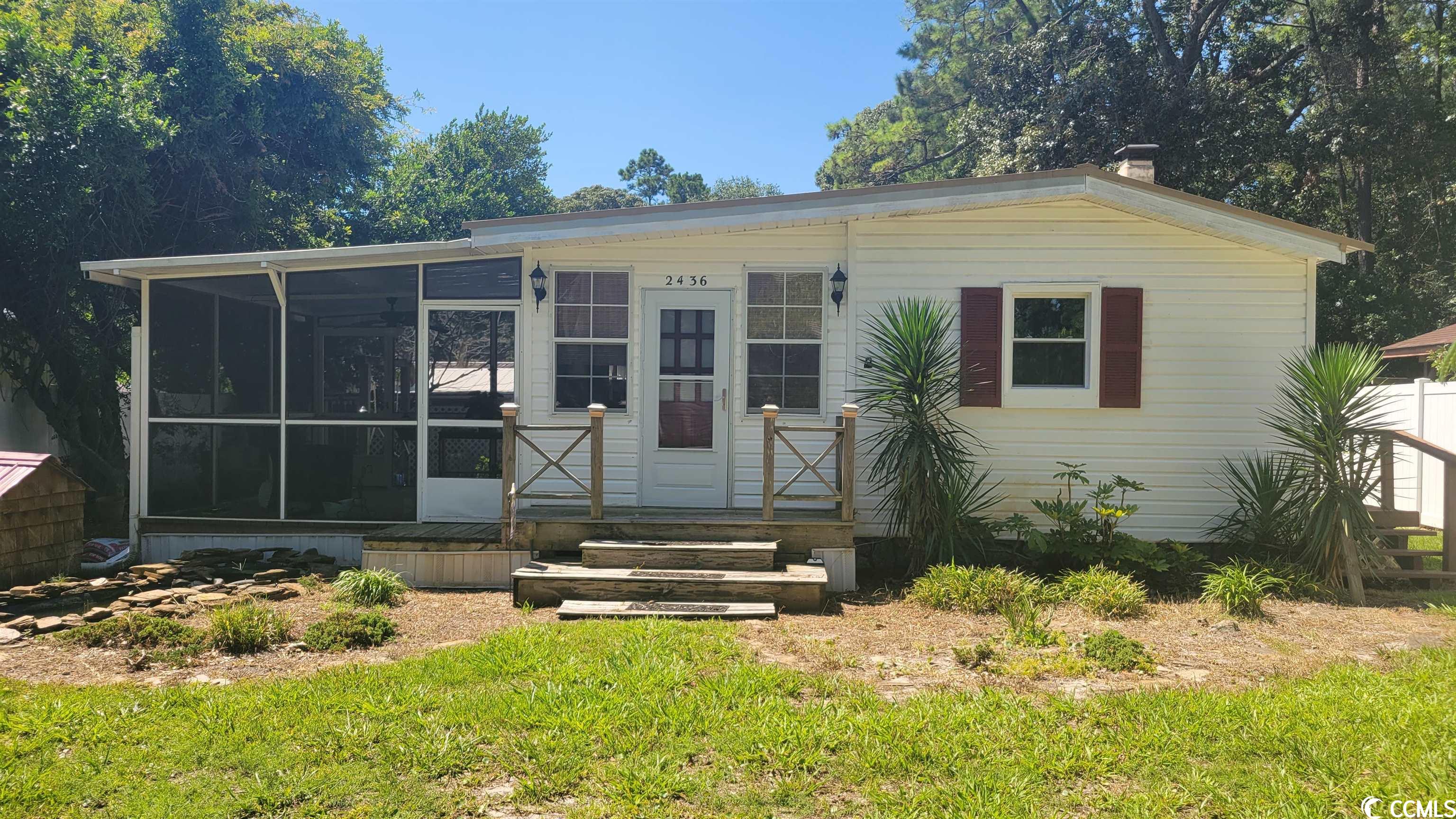 now's your chance to own this unique property in cherry grove section of north myrtle beach! this 3 bedroom, 2 bath has been split into 2 living areas. each side has its own kitchen and living room. property has large detached workshop with electric and covered areas for your bikes or jet skis, new white vinyl privacy fence, screen porch, fire pit area, and more. remodeling has been started and is waiting on you to finish!