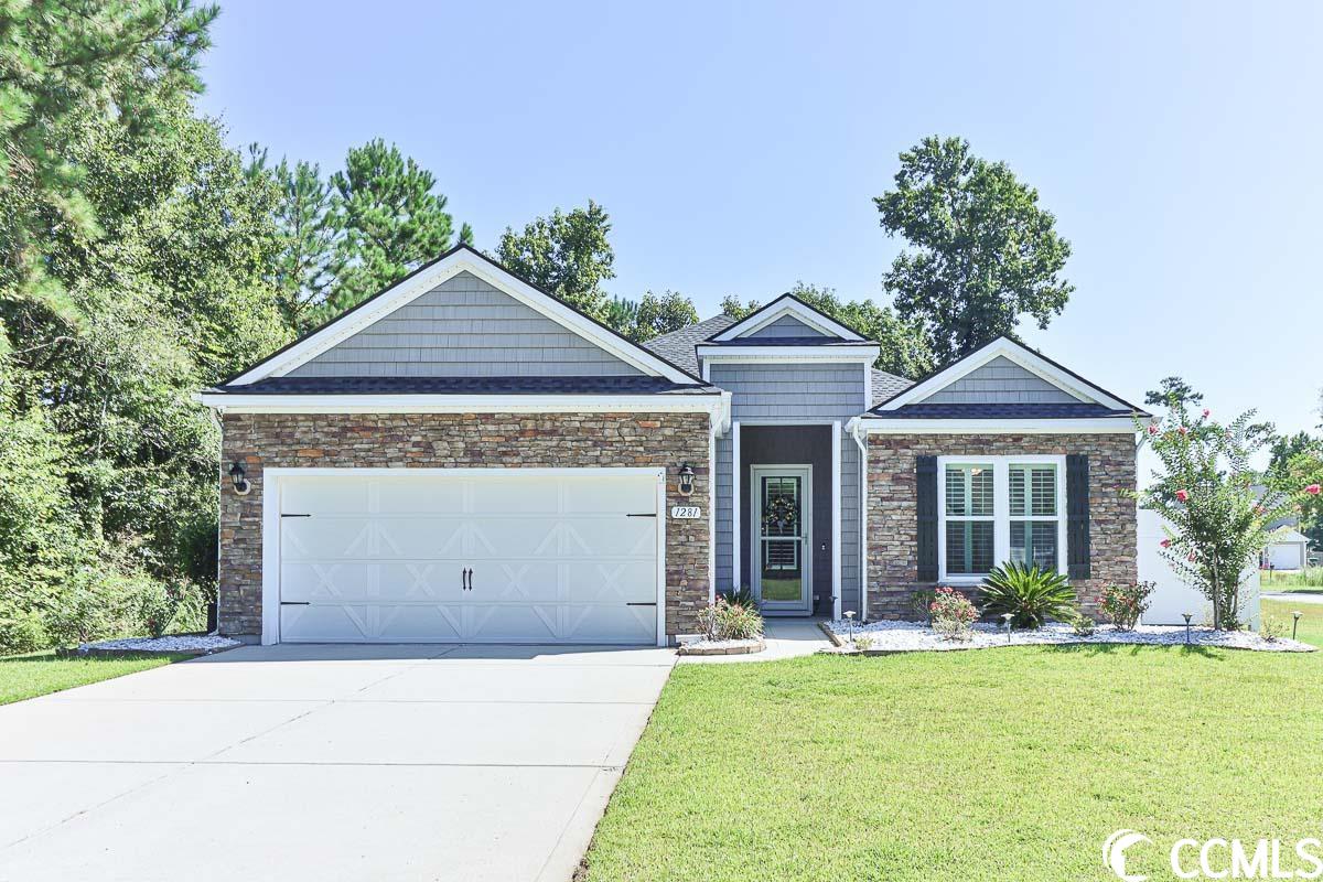 welcome to 1281 camlet ln in the serene carolina crossing community of little river! nestled on a private corner lot, this exquisite 3-bedroom, 2-bathroom home boasts a thoughtfully designed split-bedroom floorplan, offering both comfort and privacy. you'll be captivated by the open and bright living room that effortlessly flows into the heart of the home. bask in the abundance of natural light that graces the living space, highlighting the meticulously crafted built-in shelf storage and a charming fireplace, perfect for cozy evenings. the kitchen is a culinary enthusiast's dream, featuring sleek stainless steel appliances that seamlessly blend style and functionality. a spacious walk-in pantry provides ample storage, while the inviting work island features a breakfast bar, creating an ideal space for casual dining. abundant cabinet storage ensures all your kitchen essentials are organized and easily accessible. retreat to the elegant master bedroom, where tray ceilings add a touch of sophistication. the custom-built walk-in closet offers a haven of organization, while large windows invite streams of natural light to create a tranquil ambiance. the master bathroom is a true oasis, boasting custom-built dual-sink vanities and a newly installed walk-out shower, providing a rejuvenating experience. additional features of this remarkable home include a convenient mud room and a well-appointed laundry room. the spacious dining area is perfect for gatherings. the whole-house generator with an underground propane tank offers peace of mind for any situation. the enclosed porch is a great versatile space to enjoy the beauty of nature in any weather condition. step outside to the charming patio, a haven for outdoor entertaining or peaceful relaxation. embrace the community's splendid amenities, including a sparkling pool that promises to cool you off during the sizzling summer days. conveniently situated near route 57 and 9, this home offers swift access to cherry grove beach, the intracoastal waterway, barefoot landing, and an array of exceptional golf courses, shopping, dining, and entertainment options. don't miss out on your chance to call this your new home. book your showing today!
