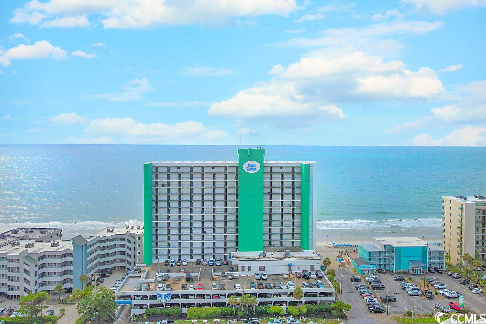 oceanfront: amazing view  wow. this fantastic, newly updated and immaculately maintained direct beach front 1 bedroom, 2 bath unit in royal gardens resort.the fully equipped kitchen includes a full-size refrigerator with working ice-maker, stove with oven, microwave, toaster, dishwasher, coffee maker, small appliances, and cookware as well as a kitchen island with bar stools. there is an in unit washer and dryer, plenty of seating in the large main living area with smart flat screen tv, a sofa that folds out to a queen size bed and a twin sleeper love seat. enjoy unsurpassed ocean views from the living area and furnished balcony deck.  royal garden is a premium condo resort. common area features include an indoor heated pool and hot tub plus an outdoor pool, kiddie pool, private walkway to beach, outdoor shower, ocean side bar, grill area, covered parking, and three-elevators. and cannot forget the salty pickle bar and restaurant. parking is in a covered garage,2 parking spots included.  royal garden resort is perfectly located in the heart of garden city with easy access to the arcade and the pier. only .7 miles from the garden city pier. close to myrtle beach and murrells inlet.   from the balcony, see sunrises and moon rises, feel the ocean breeze, hear the ocean’s therapeutic sounds and see the ocean sights where whales, dolphins, and schools of fish have been spotted-then relax by the pool, stroll on the beach, enjoy good food, good fun and good times.schedule a showing today!