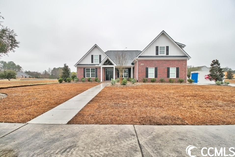 this stunning all-brick home is located on a corner lot in the highly desirable wild wing plantation subdivision. the home was built in 2021 offering a unique floorplan with tons of upgrades. coffered ceilings in the main living space for a grand presentation are accented by lvp flooring throughout. granite countertops, gray 42-inch cabinets, stainless steel appliances, and a tile backsplash in the kitchen. the master suite offers a tray ceiling, a large walk-in closet, double vanity sinks, and a massive glass shower with floor-to-ceiling tile. you will also notice this home has an additional large bedroom that could be utilized as a second master bedroom or den/office space. as you walk through the home you will see the attention to detail with upgraded trim such as 7-1/2 inch baseboards, crown molding, and wainscoting throughout. tasteful selections accentuate the space including an oversized laundry room, large tile showers in all the bathrooms, and built-ins for additional space savers. to compliment the stunning interior of the home the exterior is equally as impressive showcasing the large screened-in back porch with decorative stamped concrete, extended walkways, and a three-car sideload garage. located within minutes of the beach, as well as all the shopping, dining, and entertainment that the grand strand has to offer. schedule your showing today !!!
